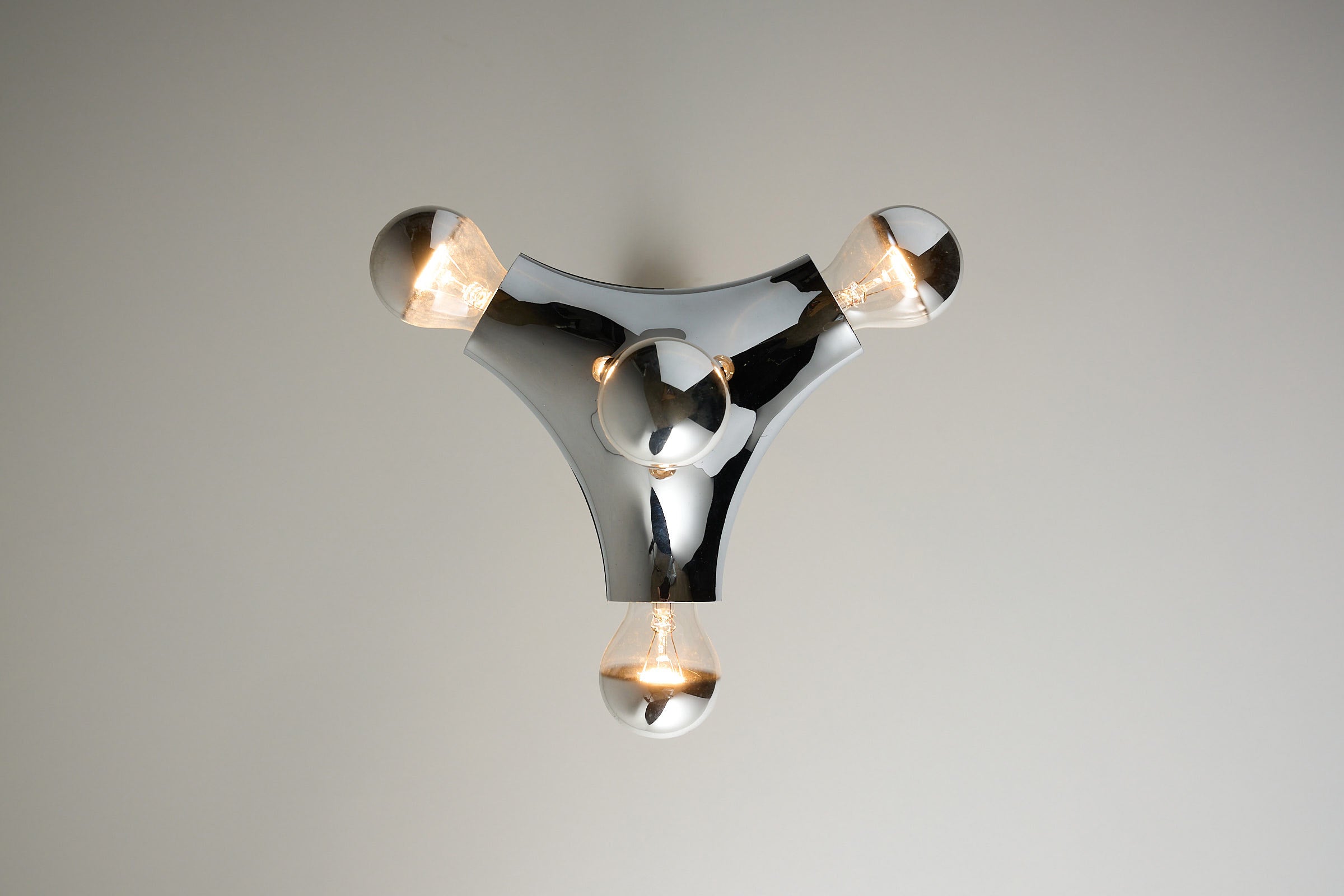 Rare Cosack 'Gemini' Space Age Chrome Pendant Lamp featuring a sculptural chrome design and three bulbs.