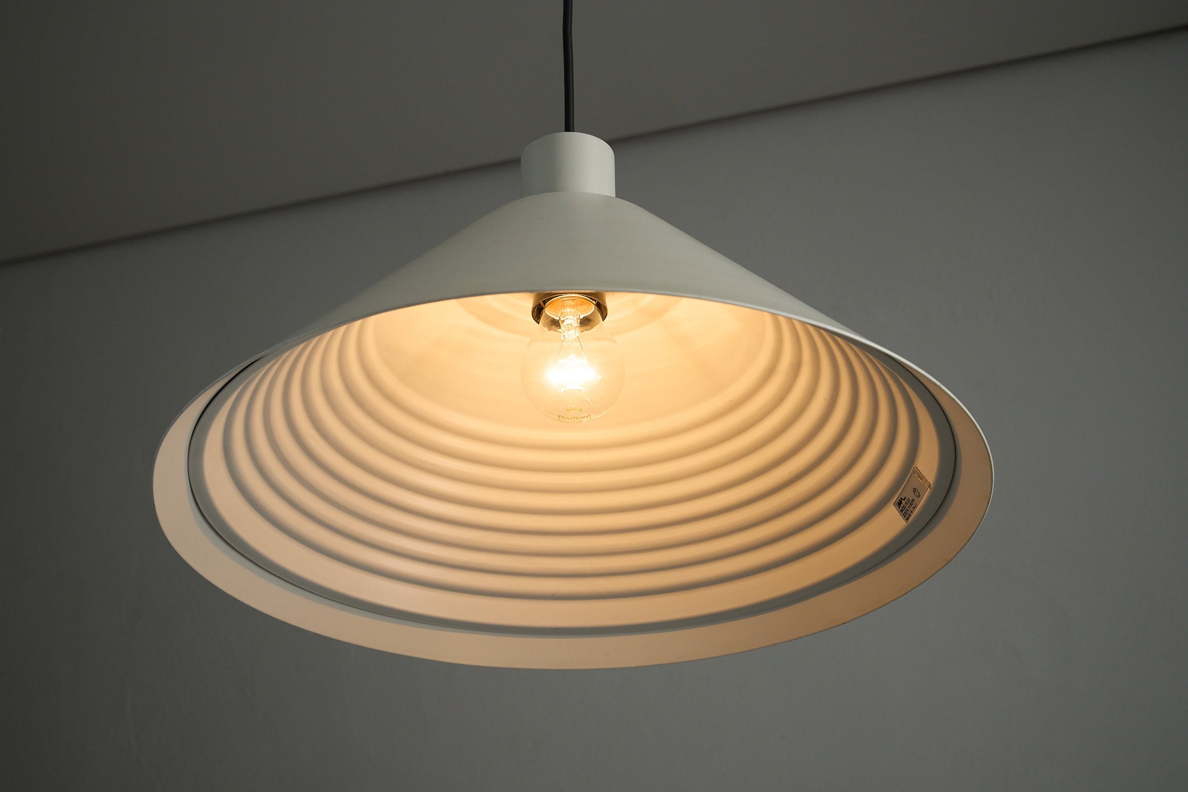 Martinelli Luce Model 1836 Conical Pendant Lamp with ribbed interior shade and white metal finish.
