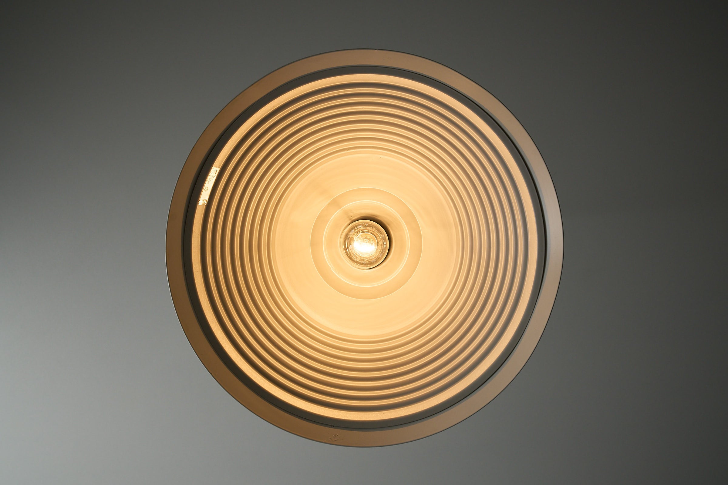 Martinelli Luce Model 1836 Conical Pendant Lamp, top view revealing ribbed inner shade and light source.