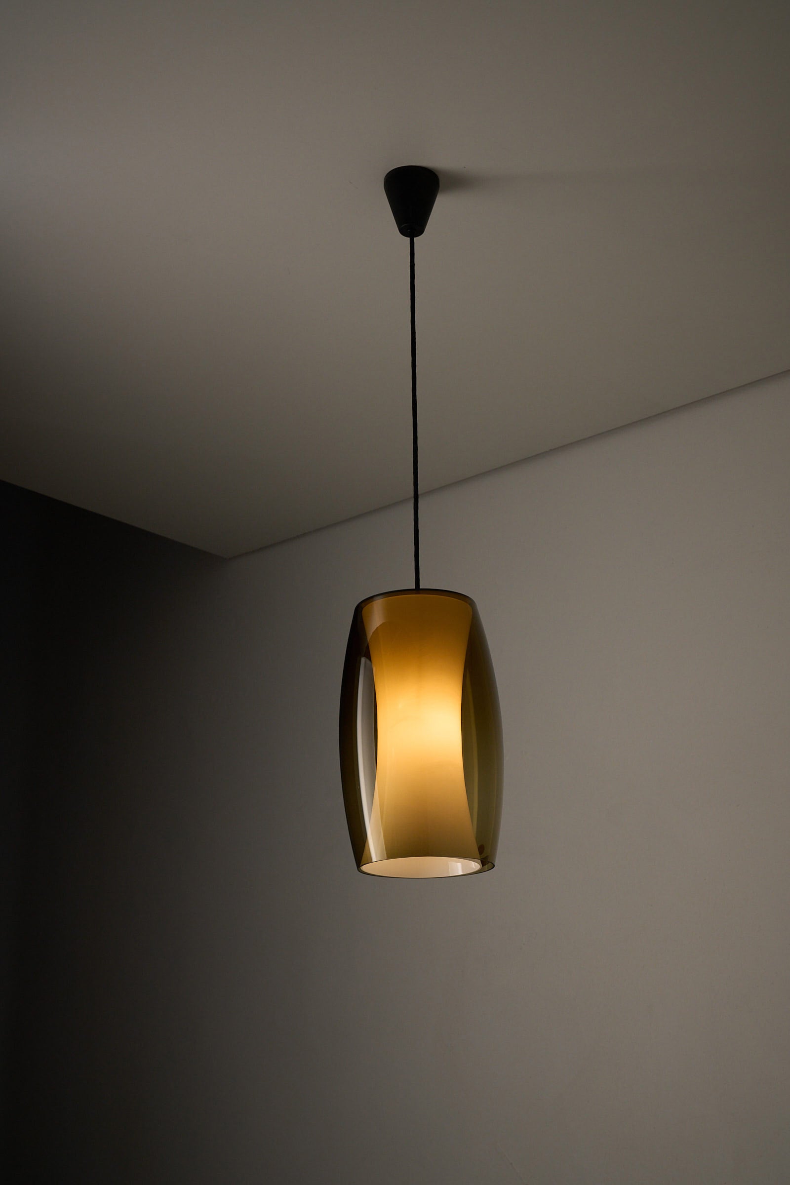 Jo Hammerborg 'Radius' Pendant Lamp for Fog&Mørup in smoky golden-brown glass, showcasing Danish design elegance.