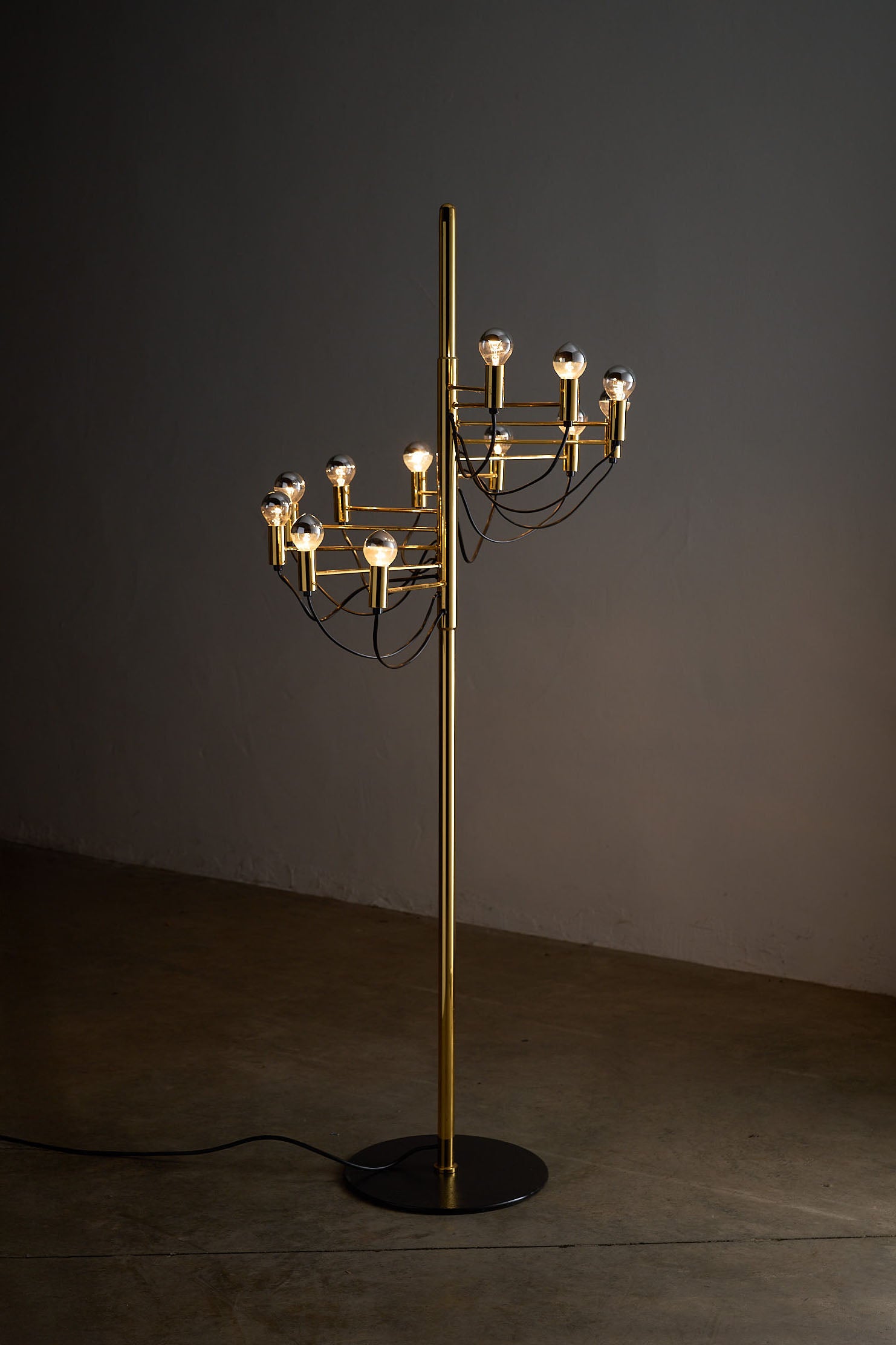 Large Sculptural Floor Lamp Executed in the design language of Gino Sarfatti with polished brass and black wiring.