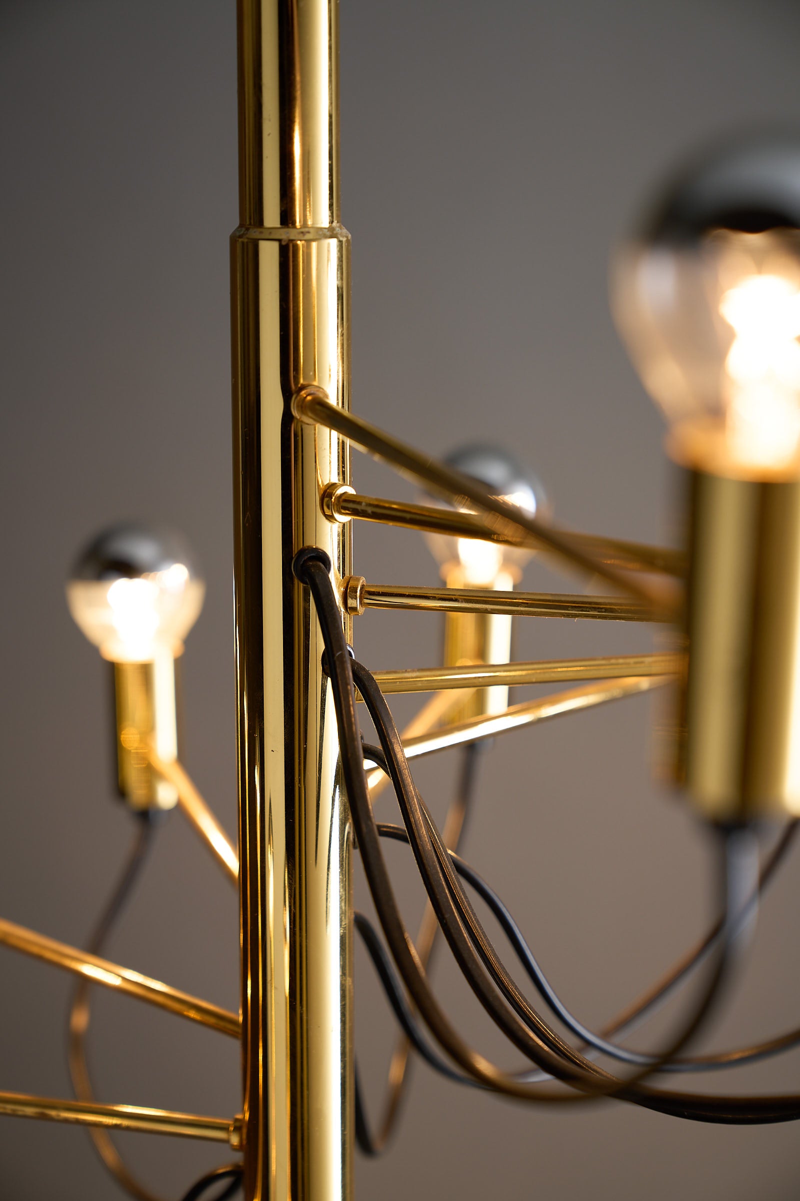 Large Sculptural Floor Lamp Executed in the design language of Gino Sarfatti, showcasing polished brass and intricate wiring.