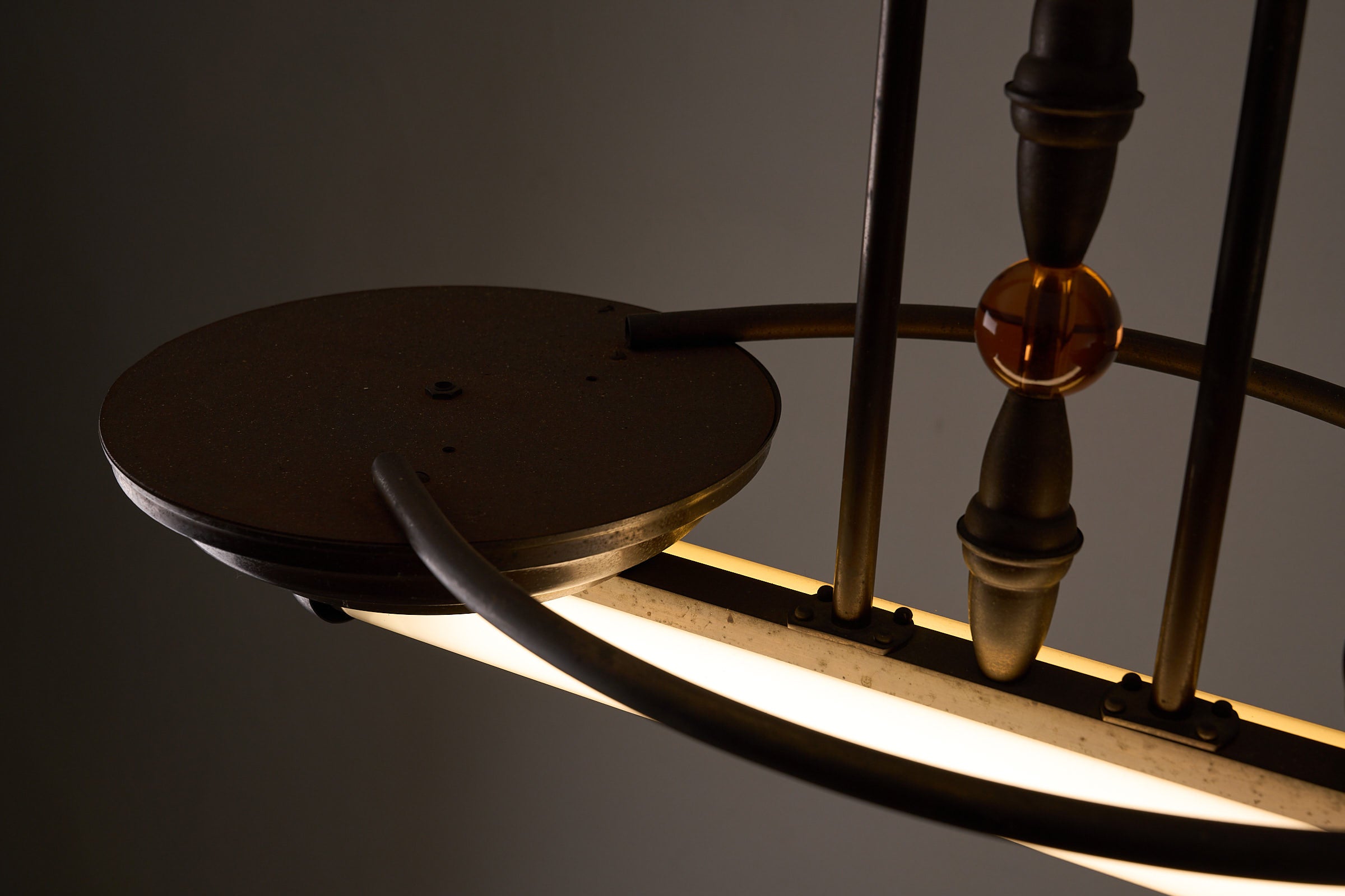 Antique Art Deco Double Fluorescent Ceiling Fixture in Patinated Bronze detail showcasing the amber glass bead and elegant design.