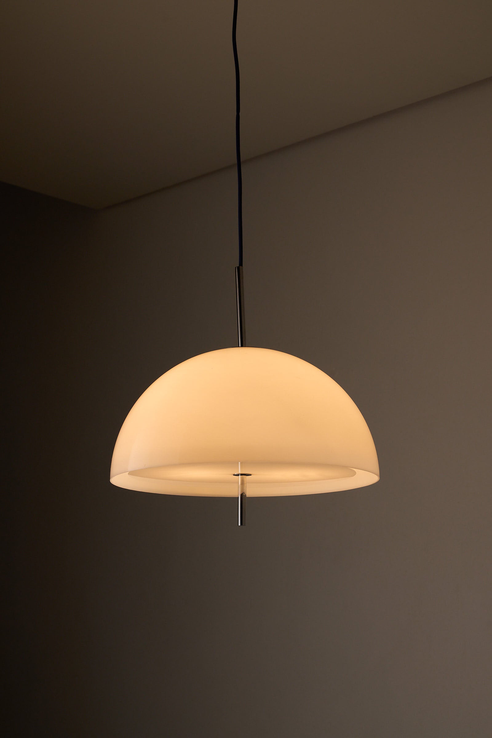 Wila Minimalist Semi-Sphere Pendant Lamp with Chrome Detail, smooth opal shade, modern design, soft glow, 1970s industrial style.