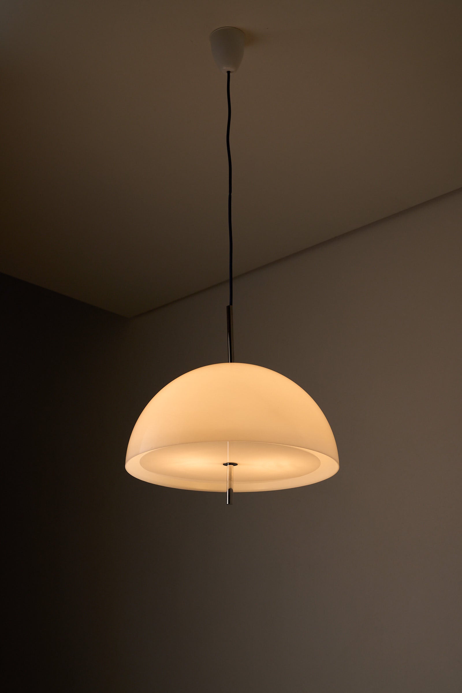Wila Minimalist Semi-Sphere Pendant Lamp with Chrome Detail, featuring smooth opal Plexiglass and a modern design.