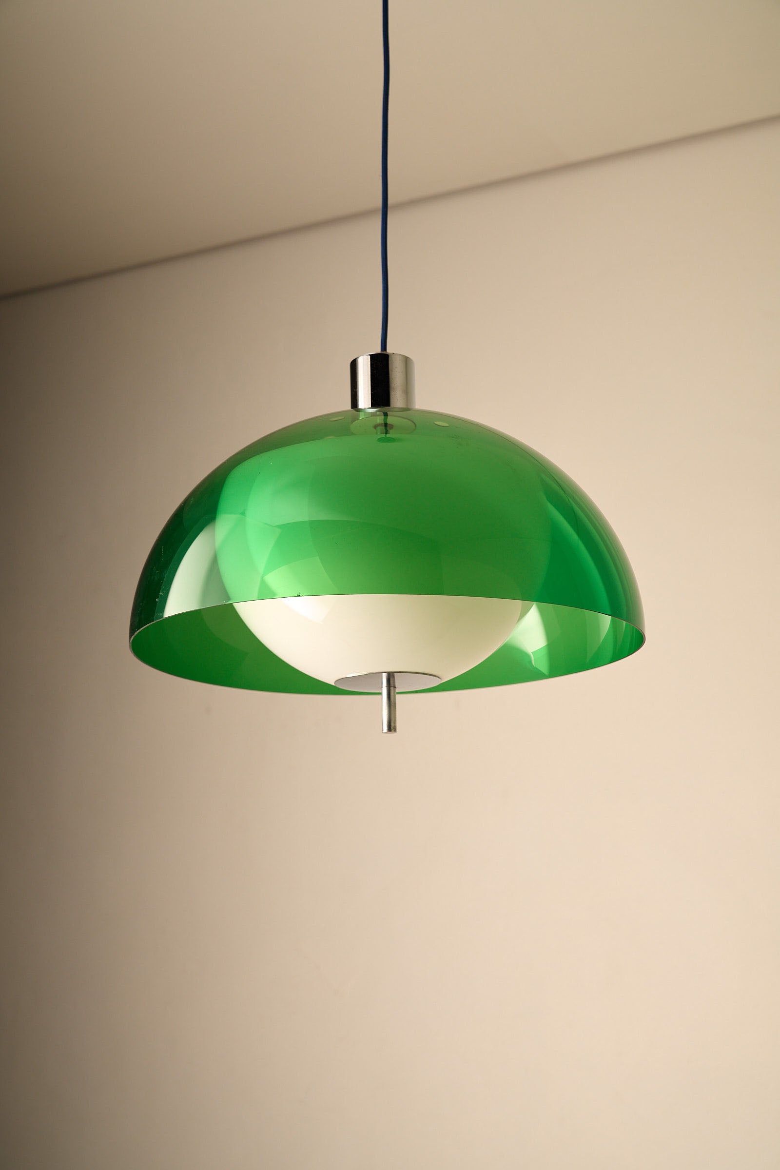 Space Age Layered Plexiglass Pendant in Green and White hanging lamp with green and white shades.