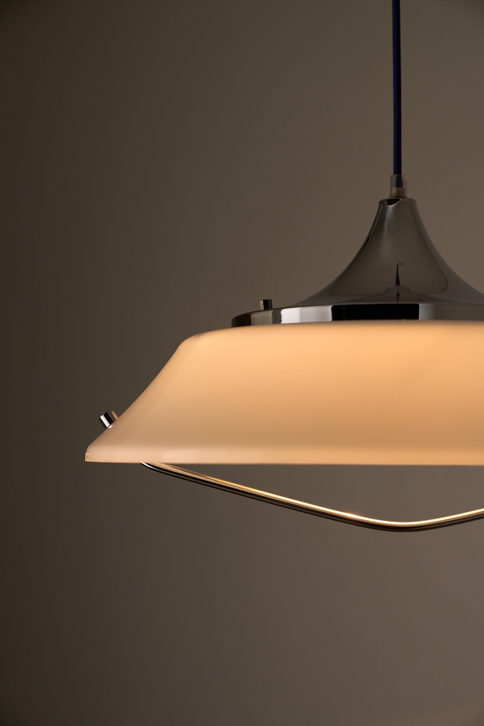 Mid-Century Modern White Acrylic Dish Pendant with Chrome Yoke lamp showcasing satin white acrylic dish and chrome hardware.