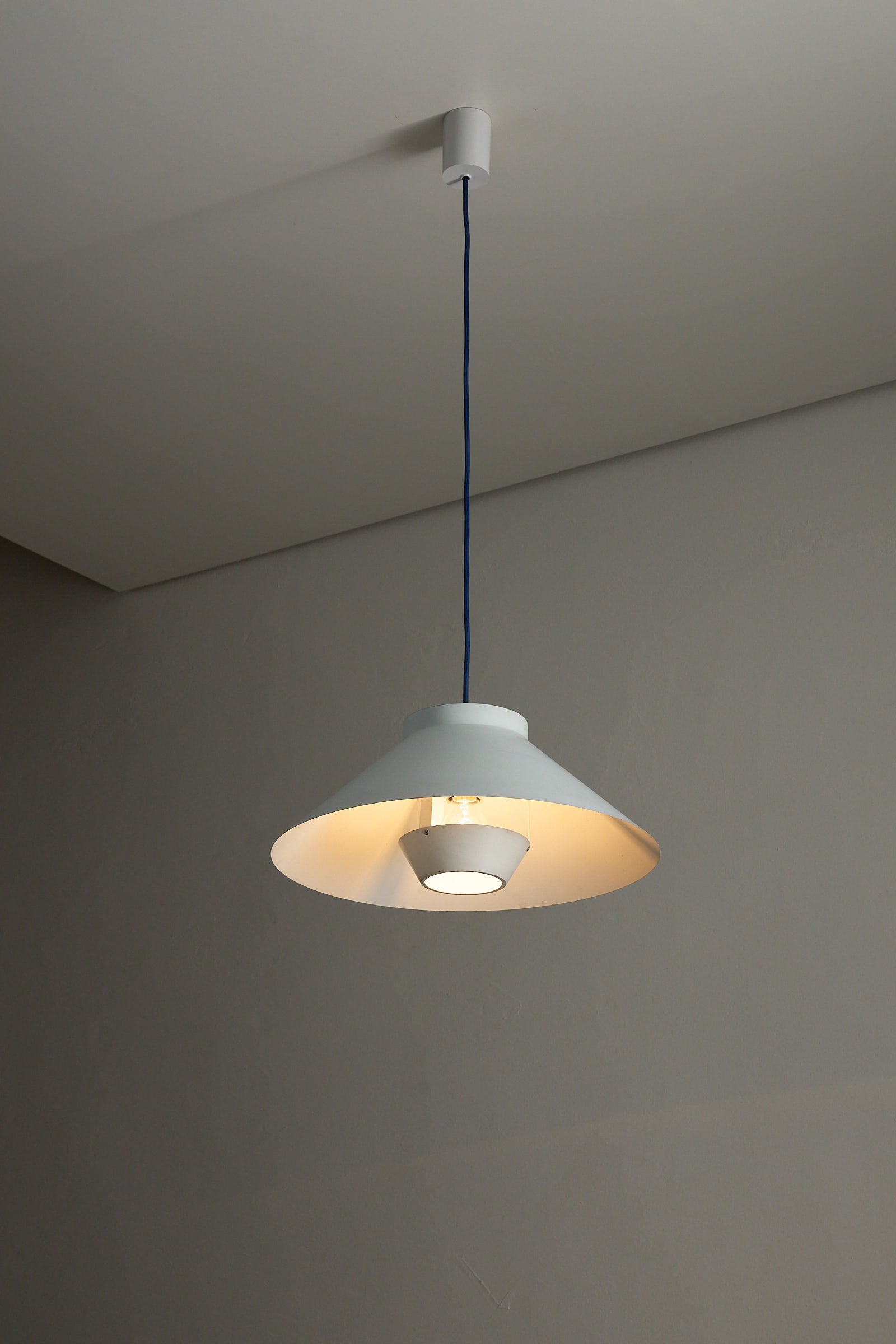 1960s Functionalist Layered Pendant Lamp in Matte White, featuring a conical shade and inner glare shield.