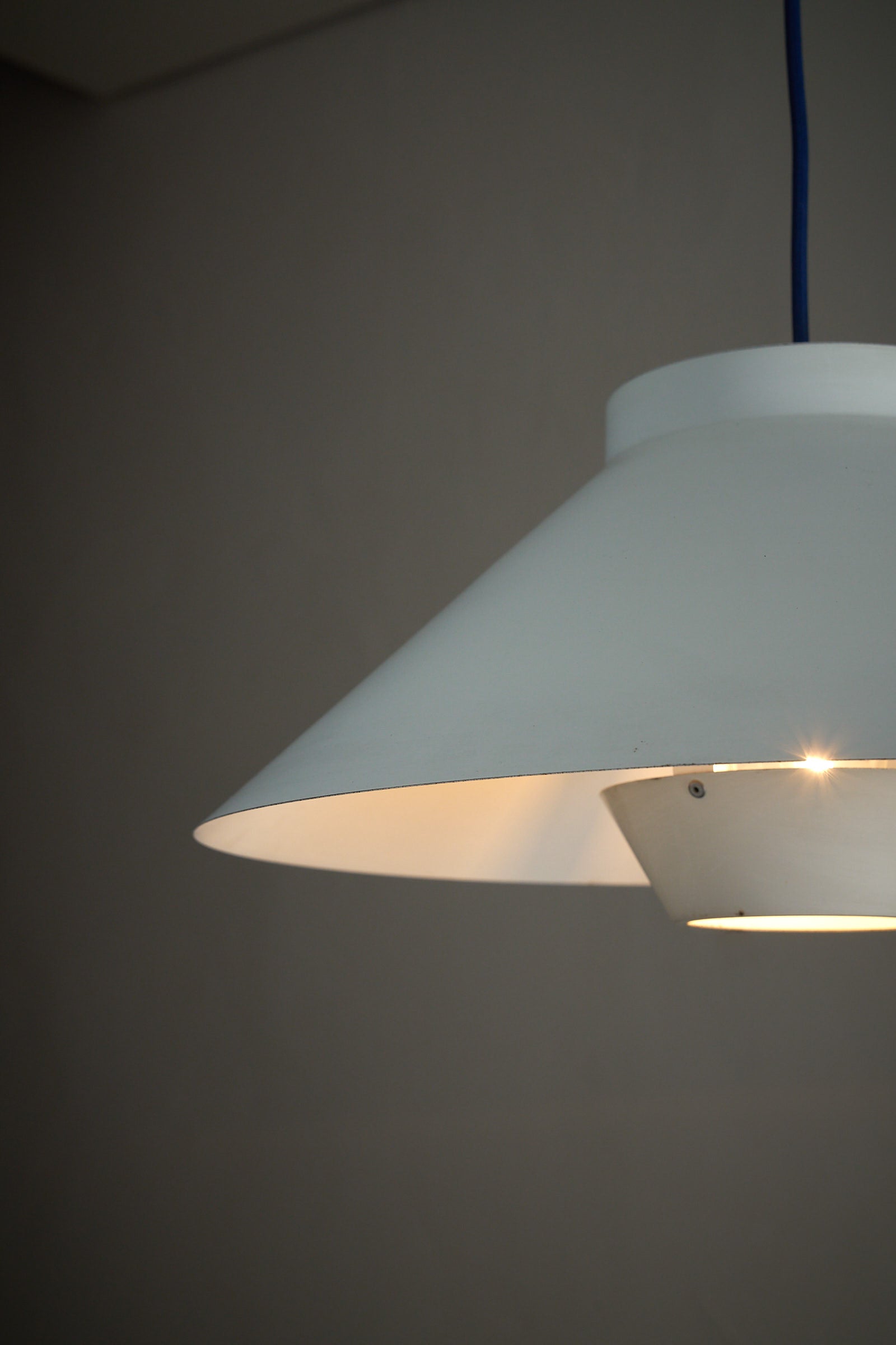 1960s Functionalist Layered Pendant Lamp in Matte White, featuring a conical outer shade and recessed glare shield.