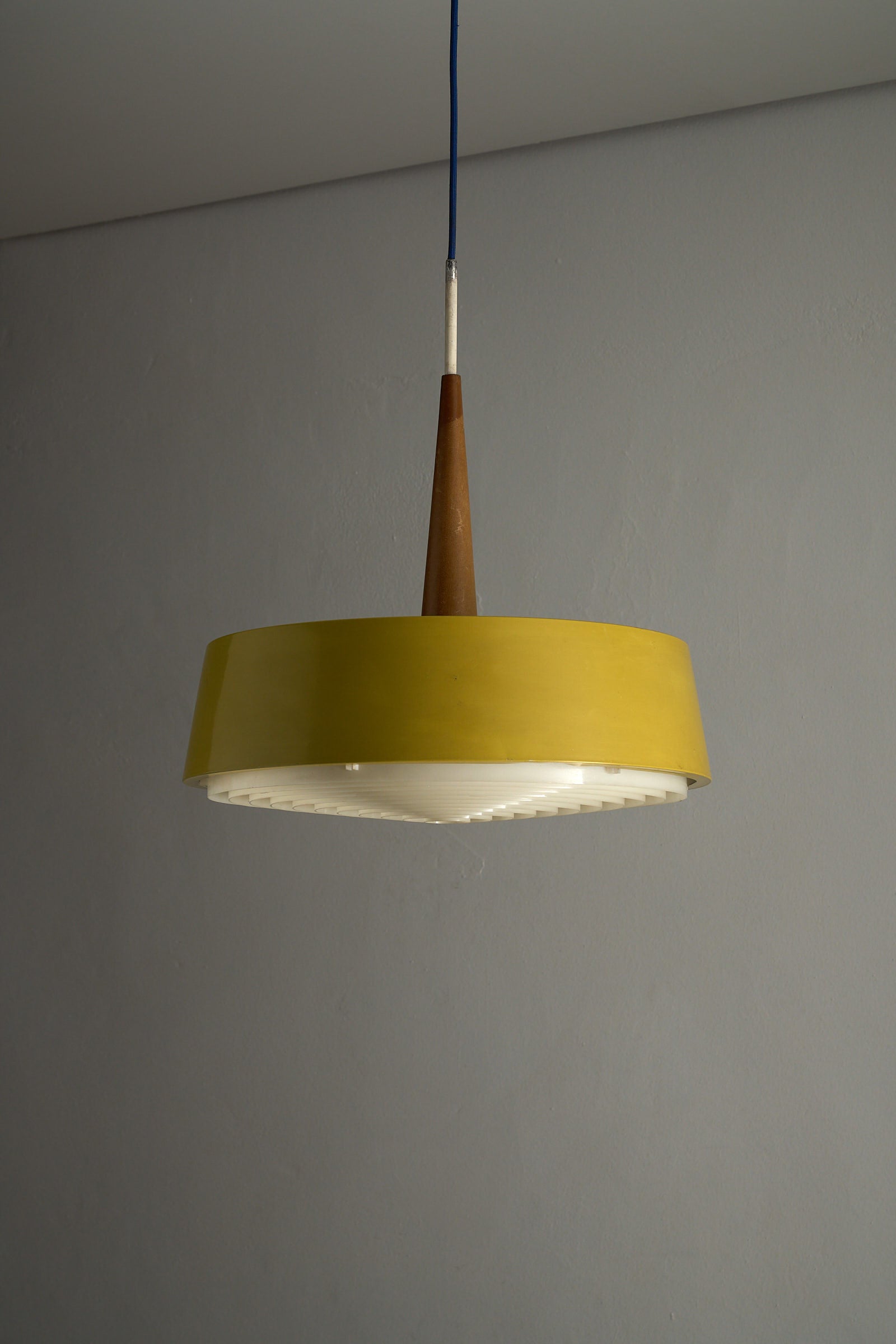 Pendant Lamp in Yellow with Teak Accent, featuring a mustard yellow shade and warm Teak wood stem.