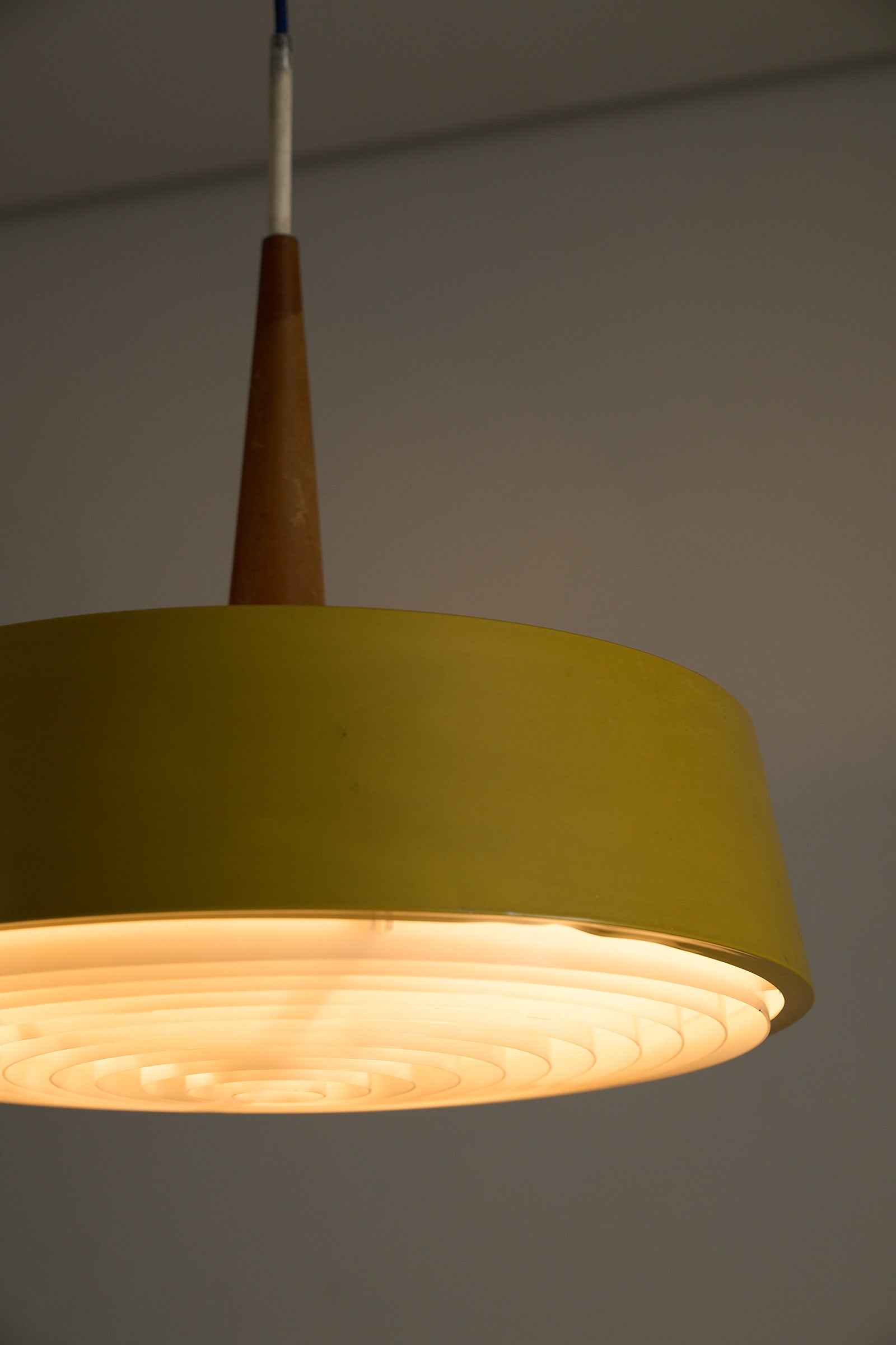 Pendant Lamp in Yellow with Teak Accent featuring a drum-shaped shade and warm Teak wood detail.