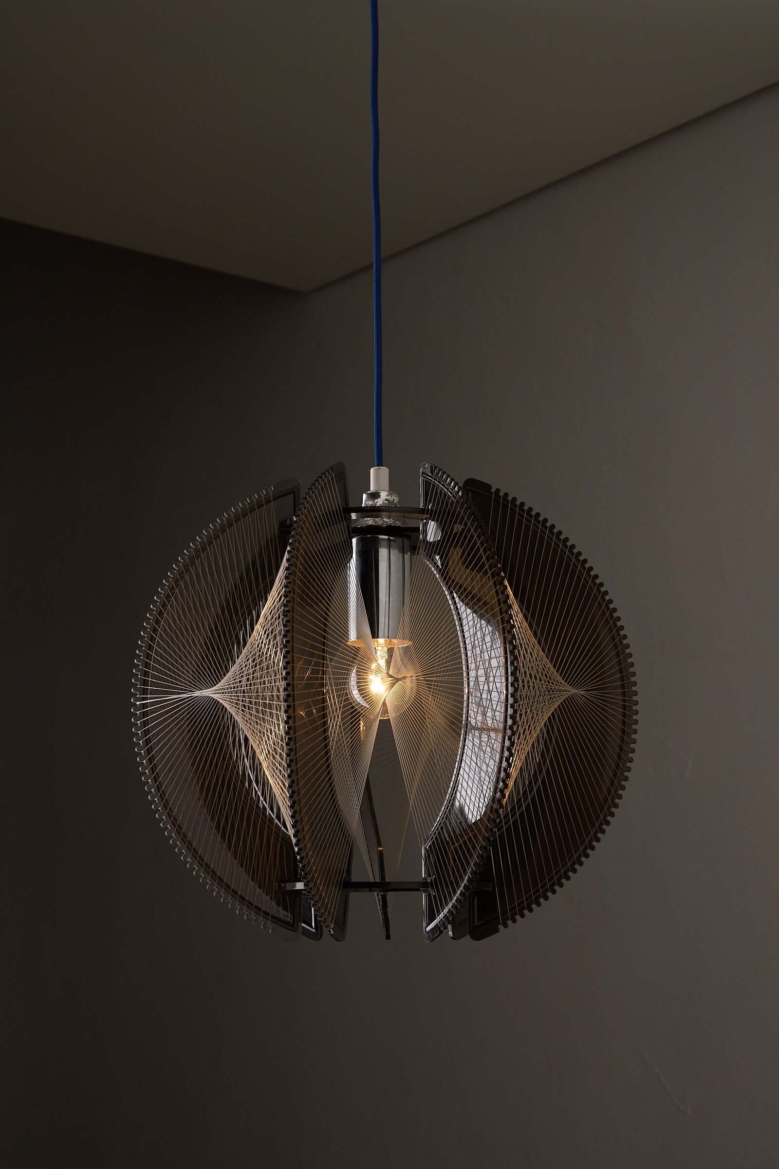 Paul Secon String Art Pendant Lamp showcasing its innovative design and light effects.