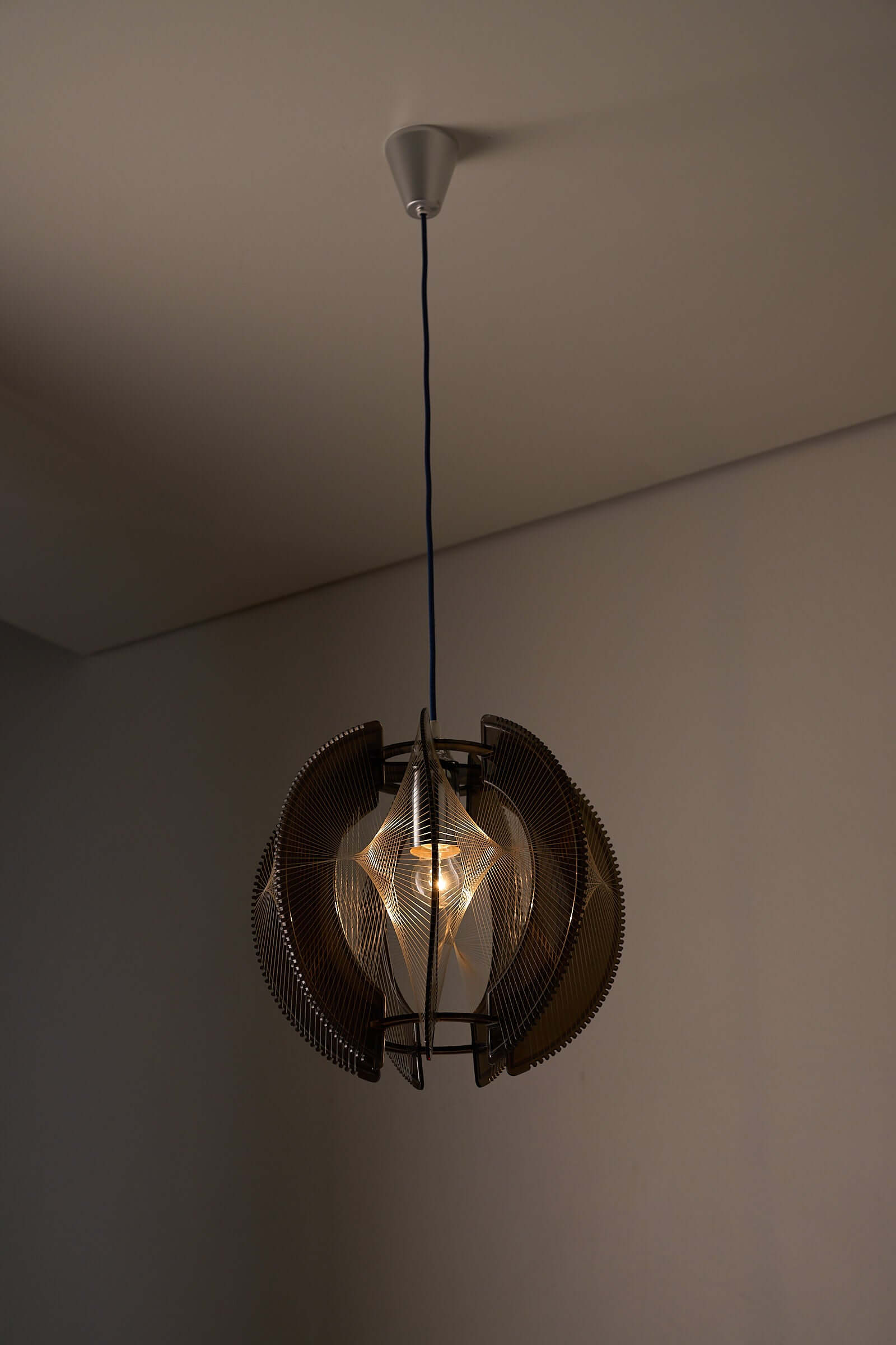 Paul Secon String Art Pendant Lamp featuring interlocking smoked acrylic segments and fine nylon strings.