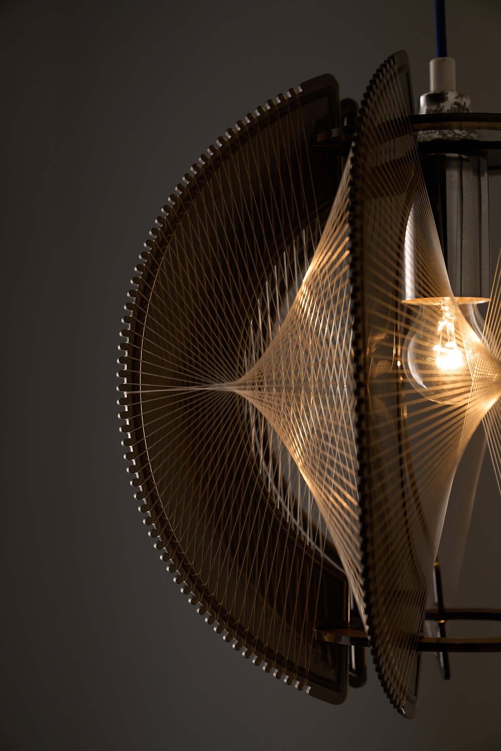 Paul Secon String Art Pendant Lamp showcasing intricate nylon strings and light refractions.