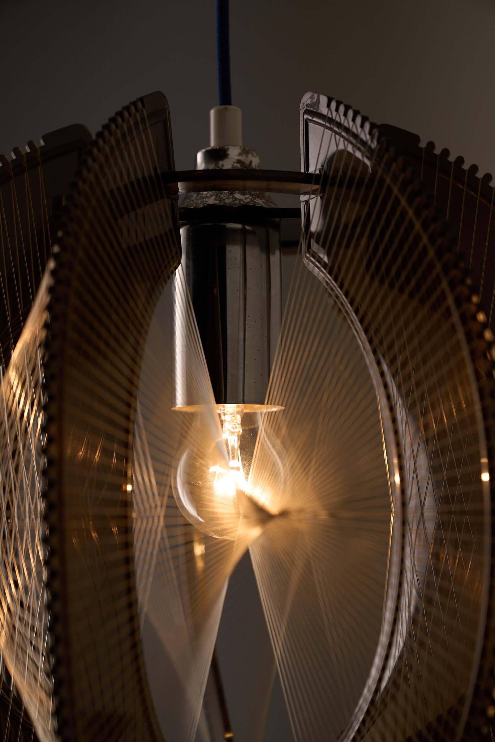 Paul Secon String Art Pendant Lamp showcasing light refractions and string tension effects.