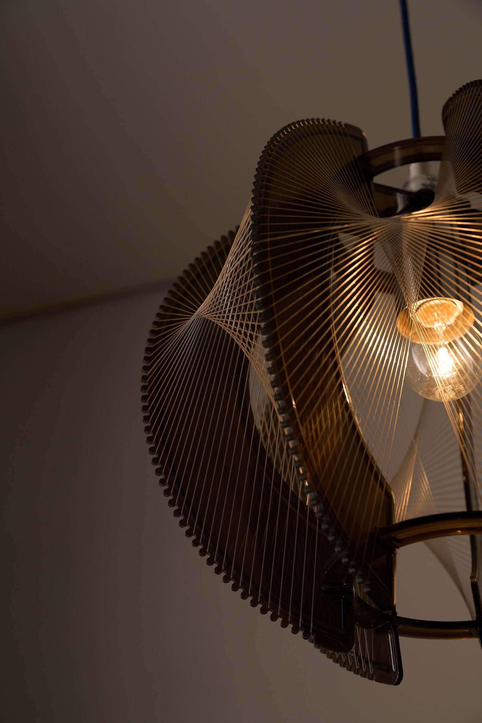 Paul Secon String Art Pendant Lamp showcasing intricate nylon strings and smoked acrylic design.