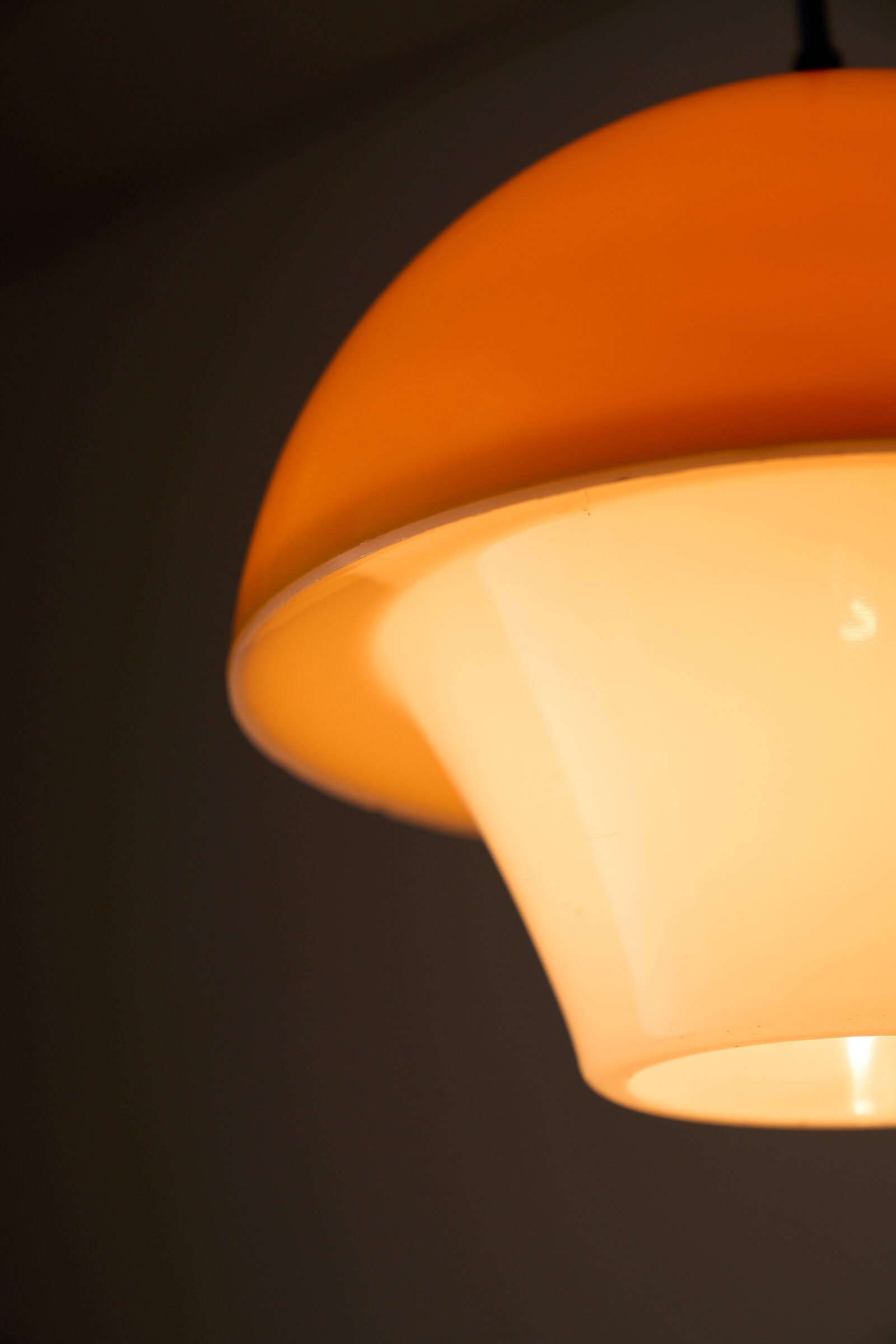 Space Age Mushroom Pendant in Yellow-Orange lamp featuring layered shades and warm light.