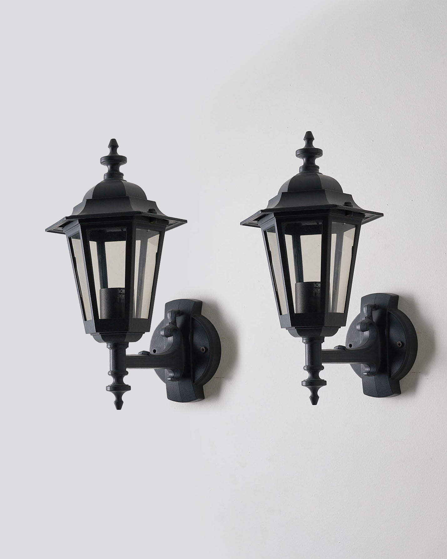 Pair of Traditional Outdoor Wall Lamps by Lothus (set) featuring classic European lantern design for outdoor lighting.
