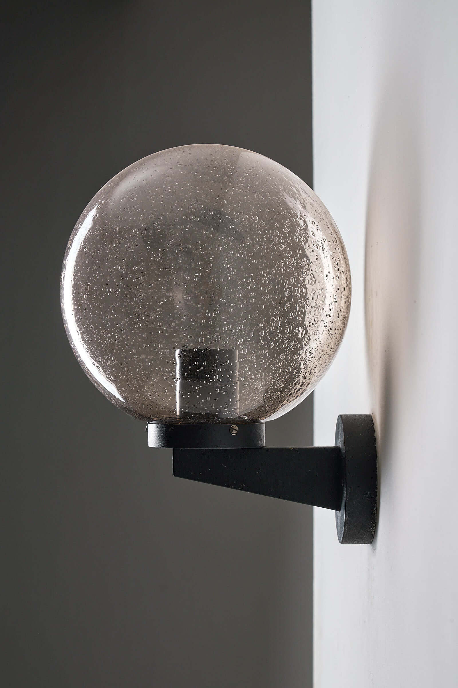 Outdoor Glass Globe Wall Light by Bega Boom, vintage exterior sconce with tinted spherical glass and dark metal arm.
