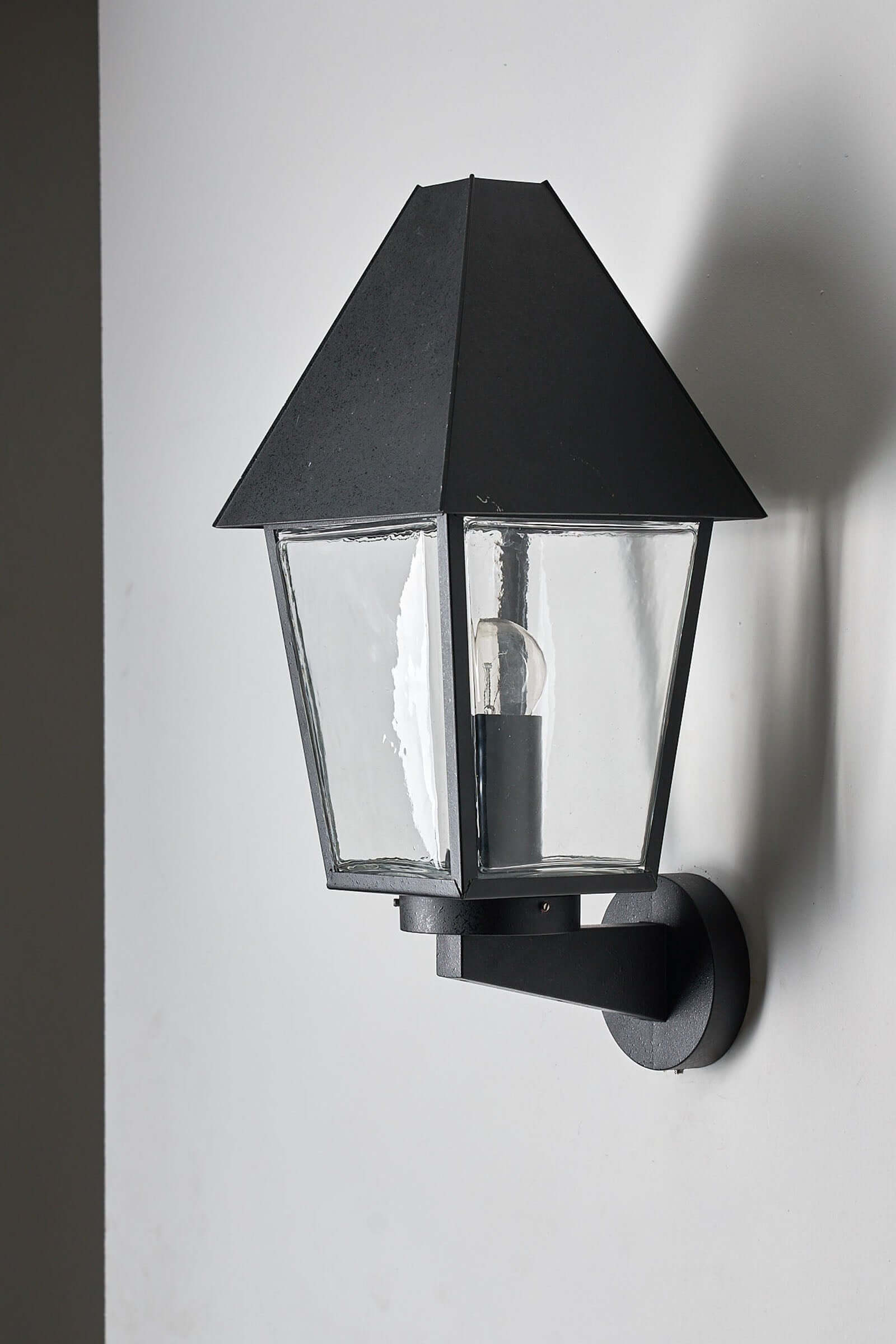 Tall Outdoor Wall Lantern by Bega Boom, 50cm with a conical shade and clear glass panels.