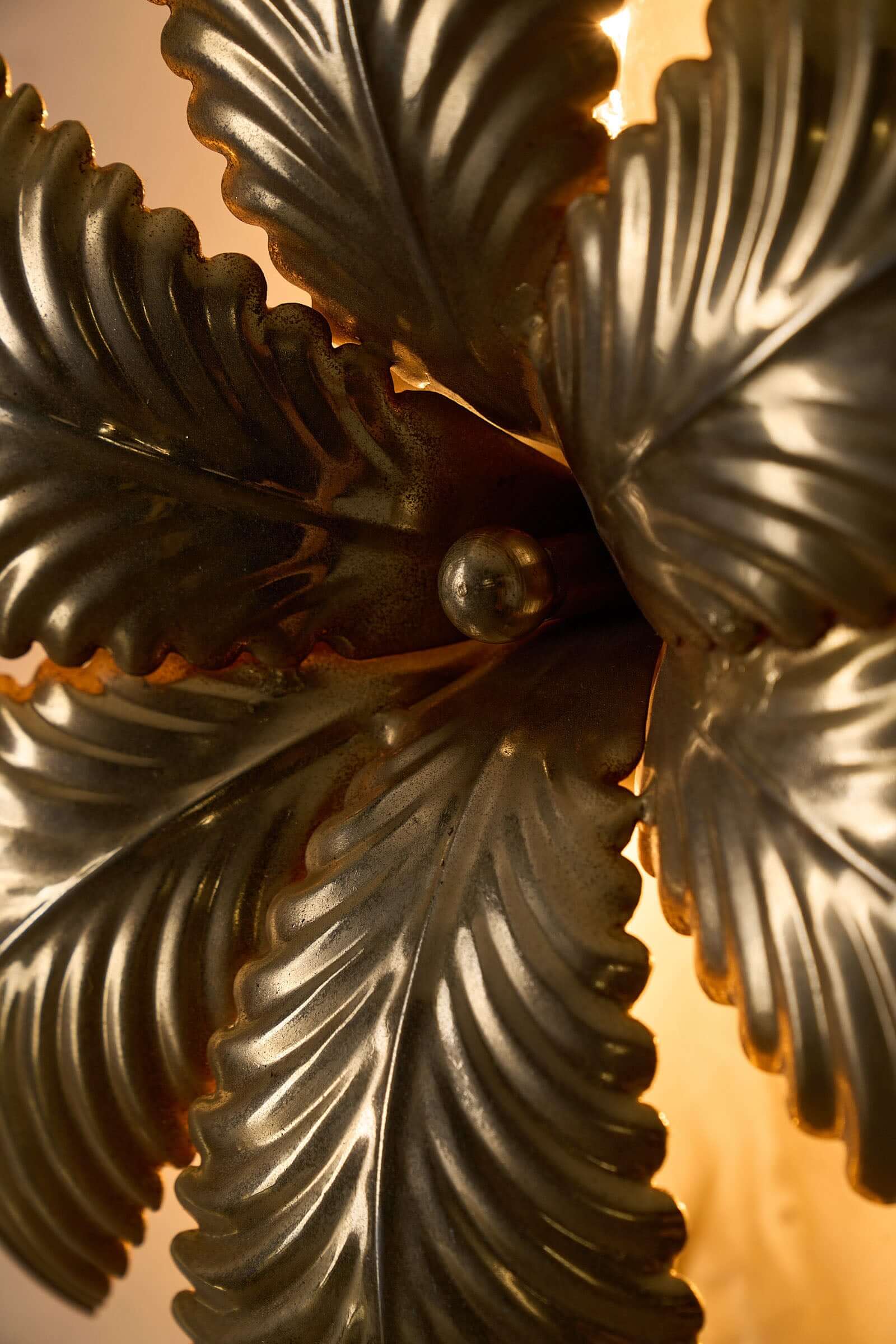 Close-up of Hans Kögl Gilded Palm Leaves Wall Light/Flush Mount showcasing detailed gilded metal palm leaves.
