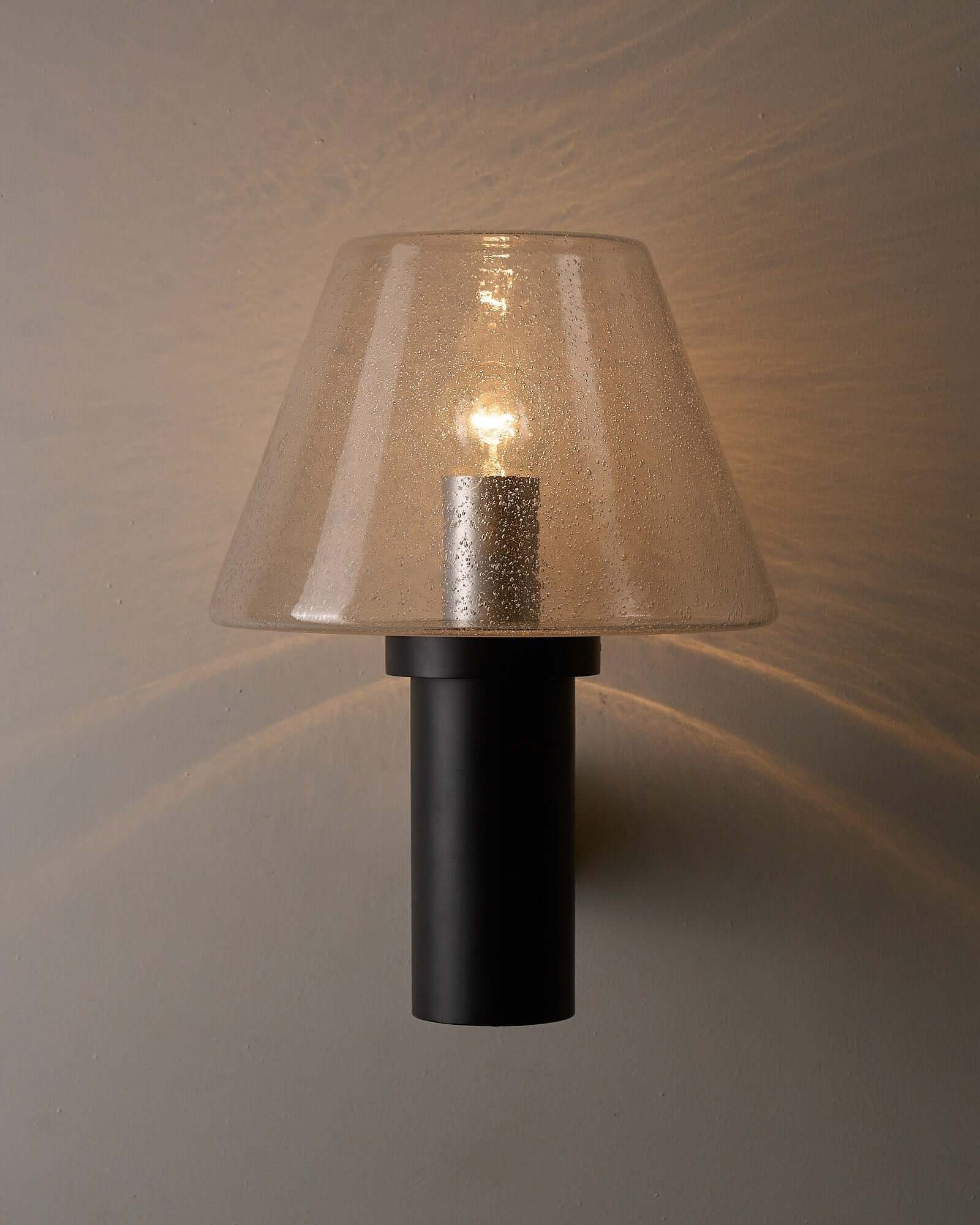 Glashütte Limburg Bubble Glass Outdoor Sconce with smoke-tinted glass and dark cast metal base.