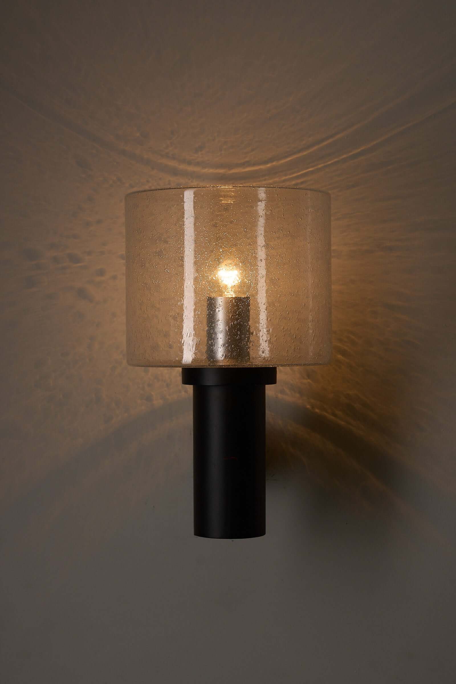 Glashütte Limburg Conical Bubble Glass Outdoor Sconce, smoke-tinted handblown glass outdoor lamp with bubble texture.