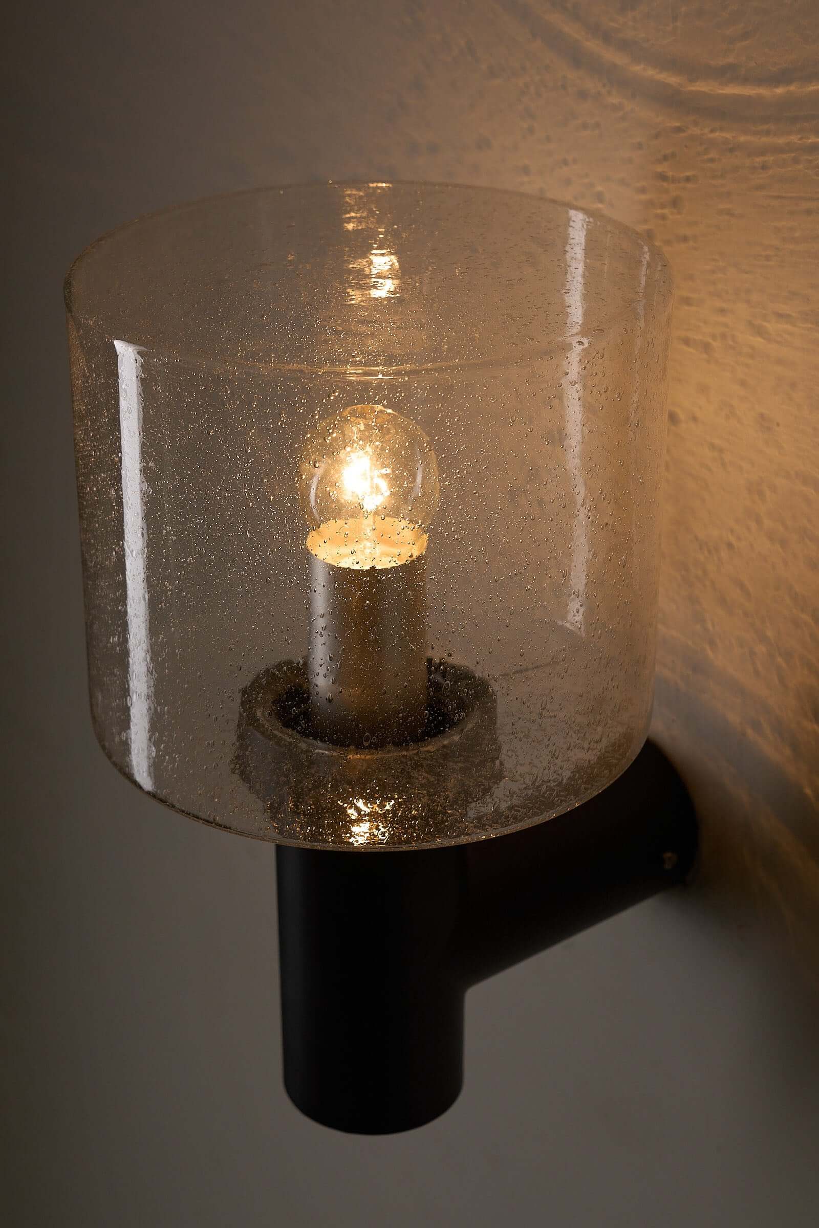 Glashütte Limburg Conical Bubble Glass Outdoor Sconce with smoke-tinted handblown glass and black metal base.