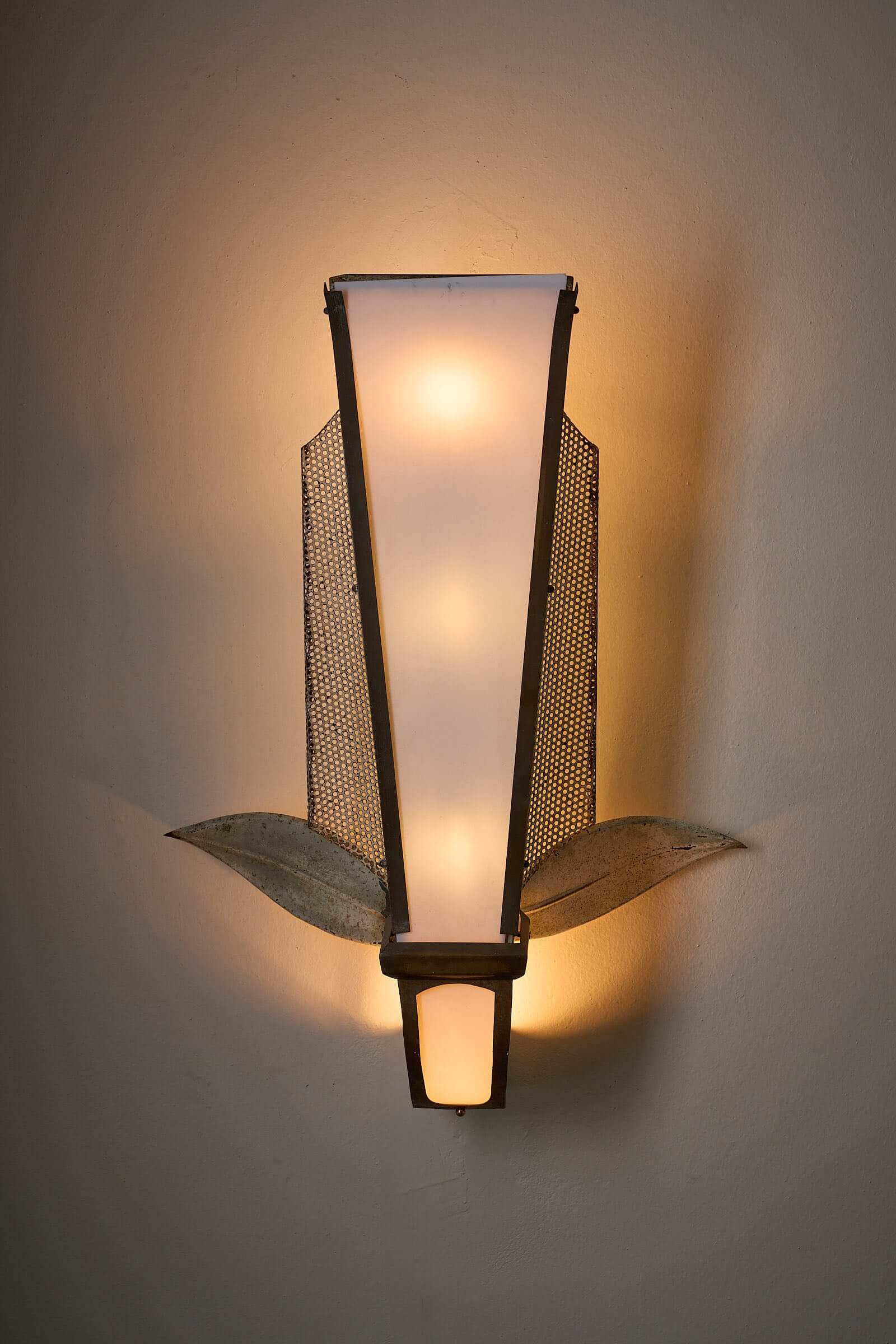 Grand Parisian Art Deco Wall Sconce featuring Plexiglass diffuser and perforated metal with stylized leaves.