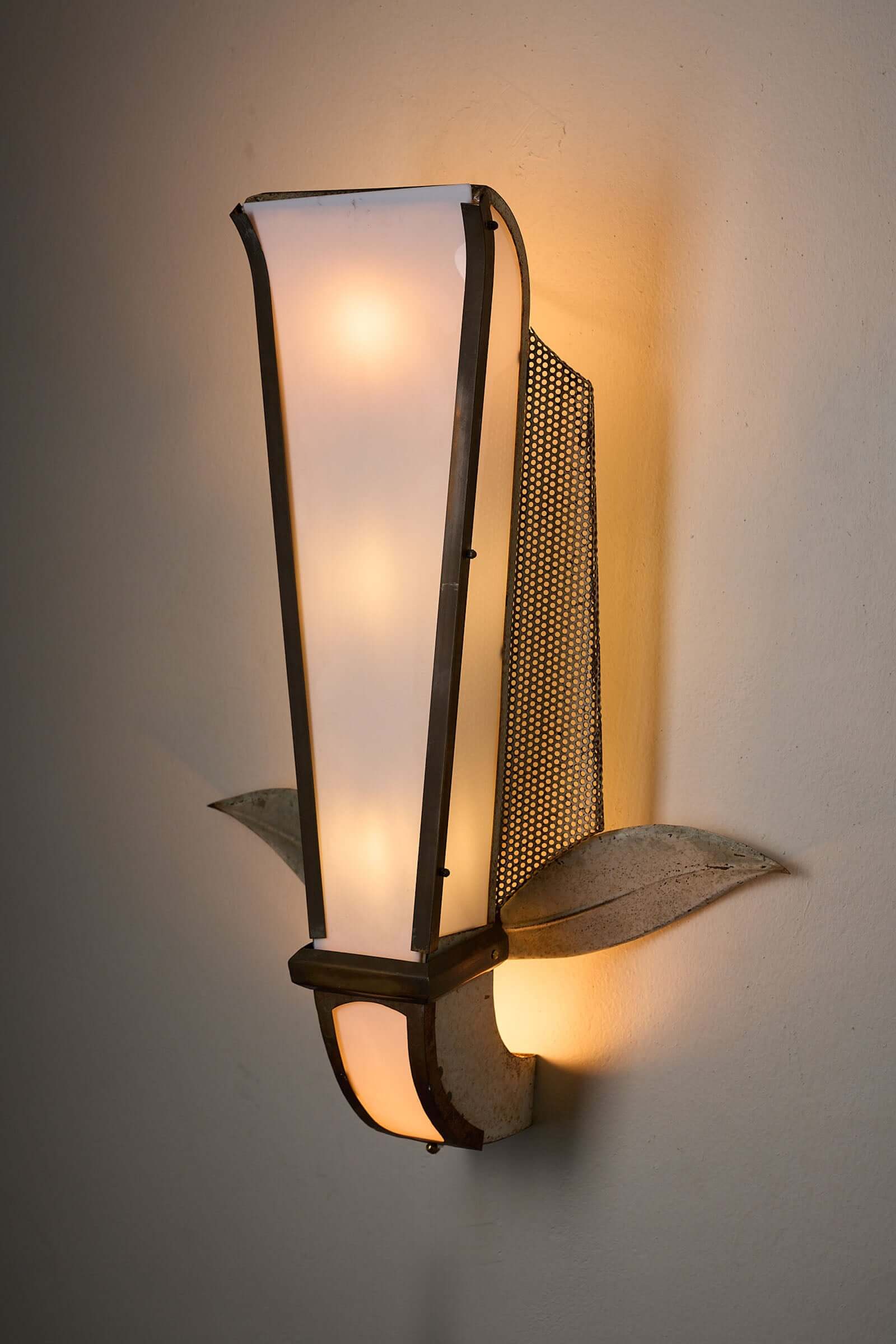 Grand Parisian Art Deco Wall Sconce featuring tall Plexiglass diffuser and stylized metal leaves in a dark metal frame.