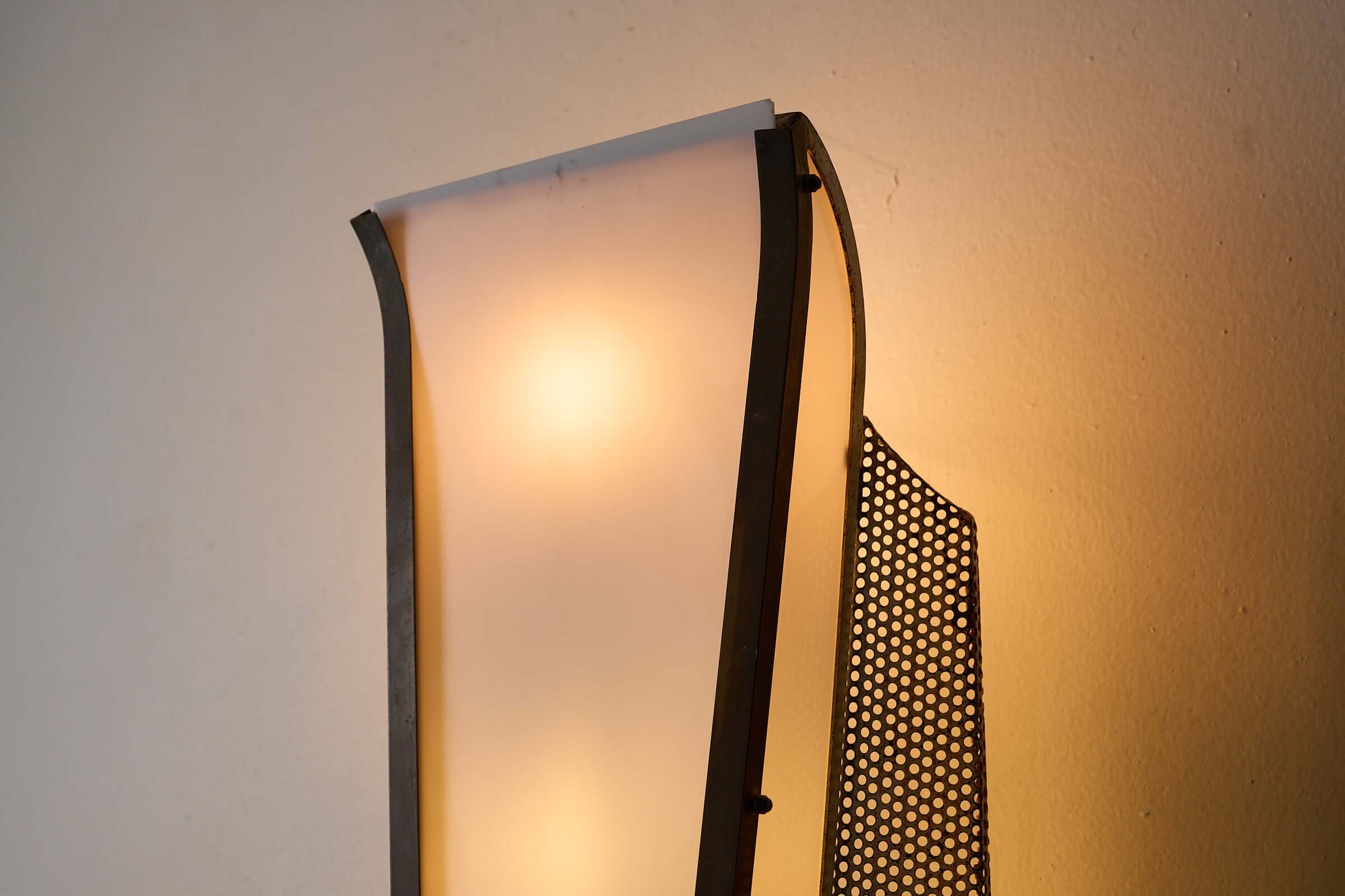 Grand Parisian Art Deco Wall Sconce featuring a tapered Plexiglass diffuser and perforated steel element.