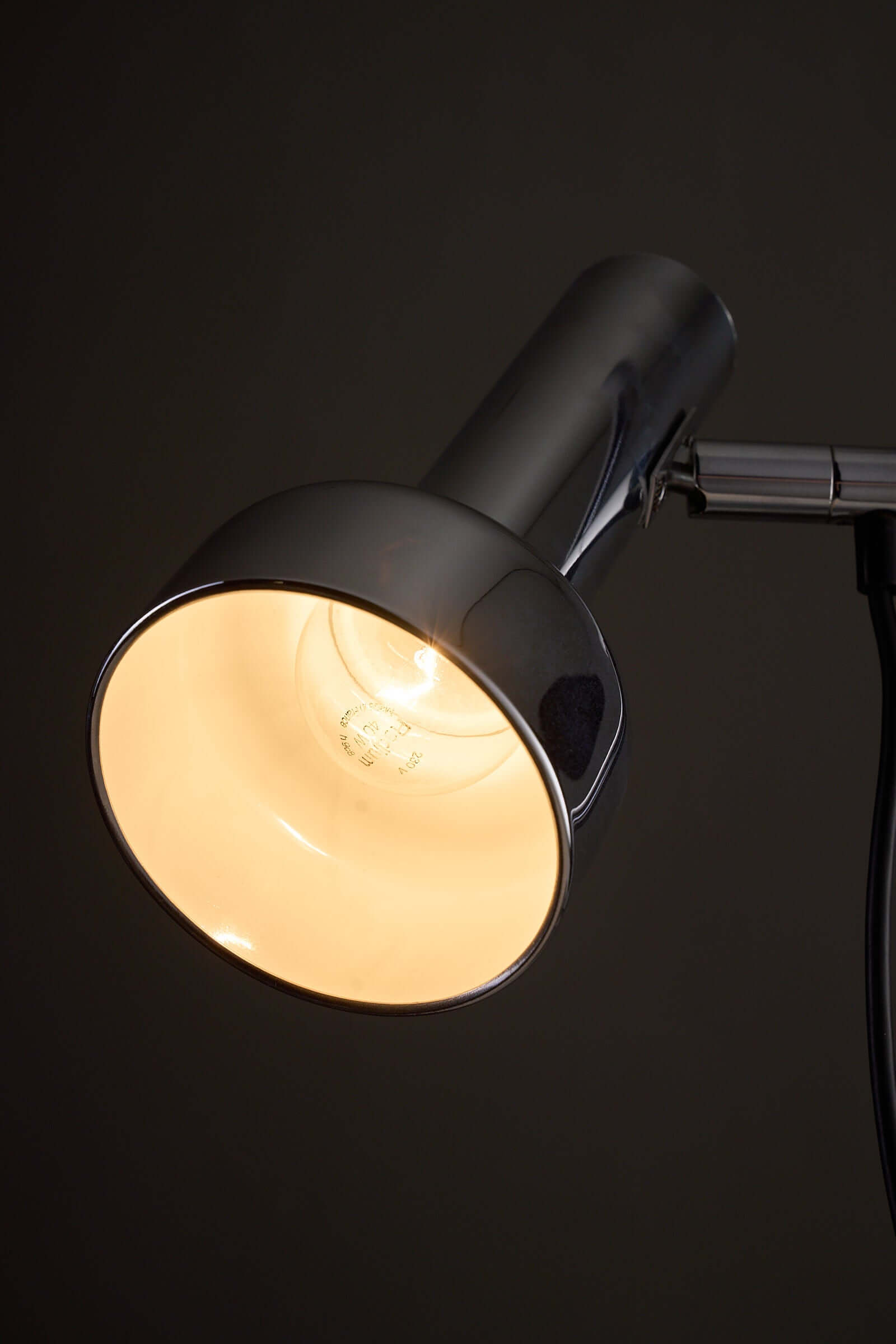 Close-up of the Adjustable Chrome Table Lamp Model 7973 by Cosack showcasing the cylindrical light head.