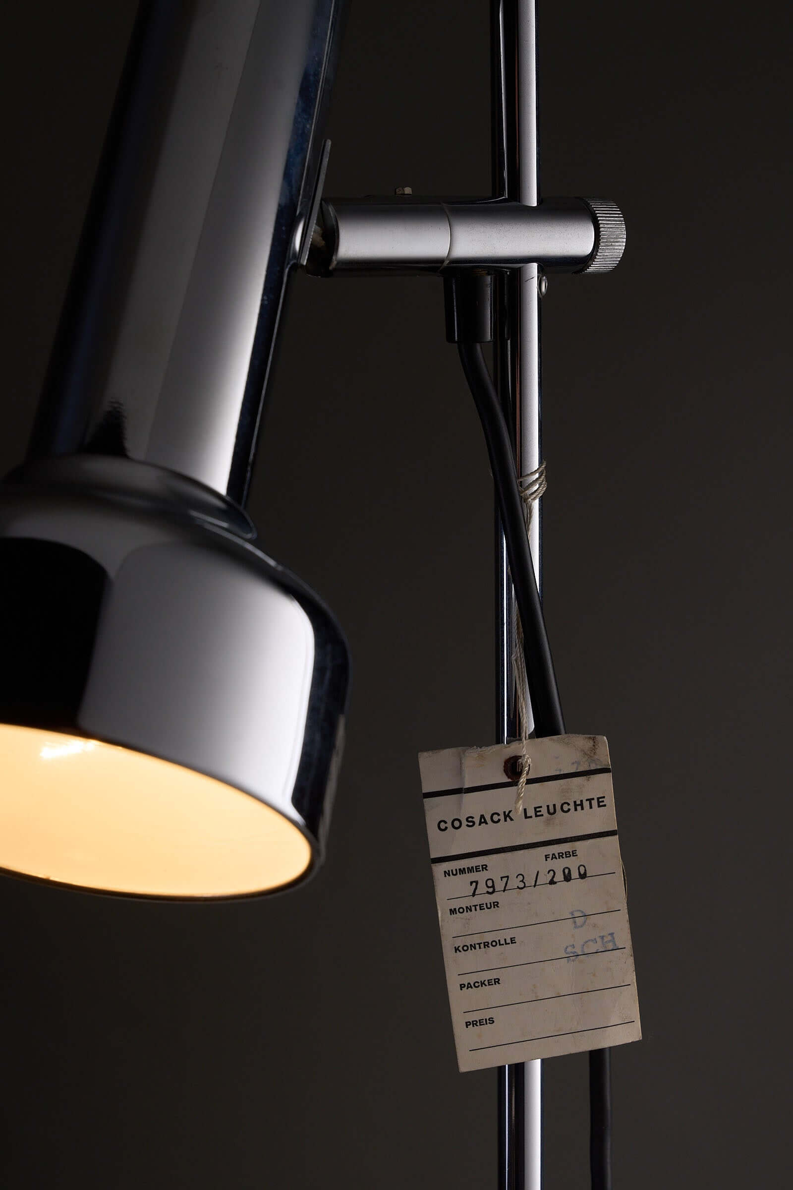 Adjustable Chrome Table Lamp Model 7973 by Cosack with manufacturer tag and polished chrome finish.