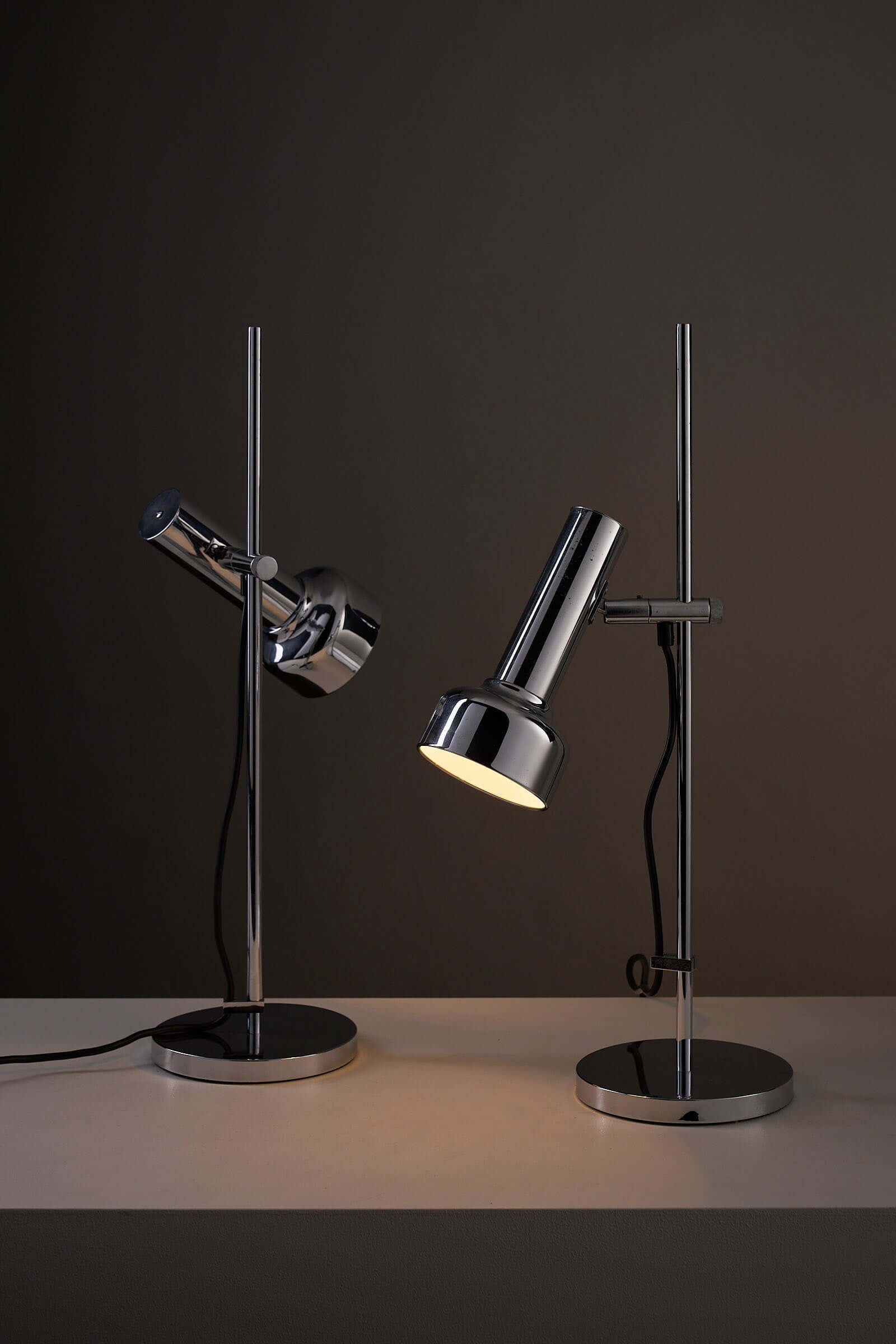 Adjustable Chrome Table Lamp Model 7973 by Cosack in modern design, showcasing adjustable heights and pivoting light heads.