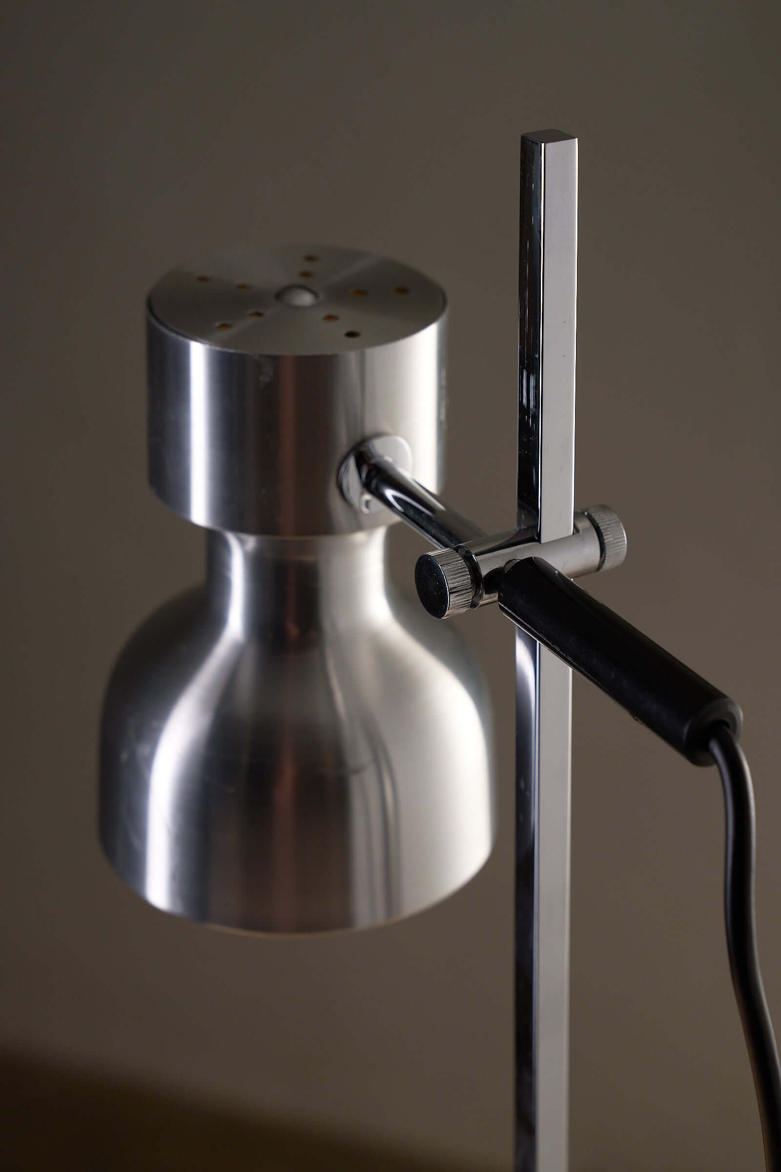 Desk Lamp Cosack Diabolo Shade in Aluminium with chromed steel structure and adjustable shade for focused lighting.