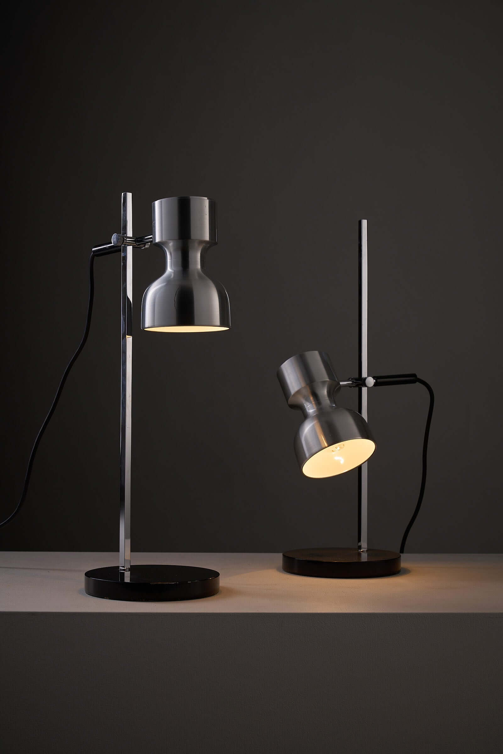 Desk Lamp Cosack Diabolo Shade in Aluminium, showcasing modern design with adjustable light direction on a stylish base.