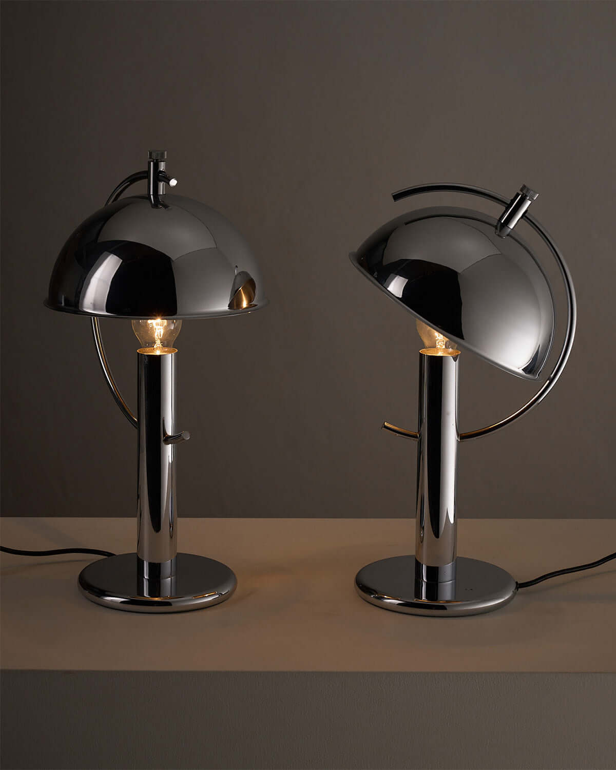 Cosack Chrome Semi-Sphere Desk Lamp showcasing two adjustable desk lamps with chrome finish and semi-sphere reflectors.