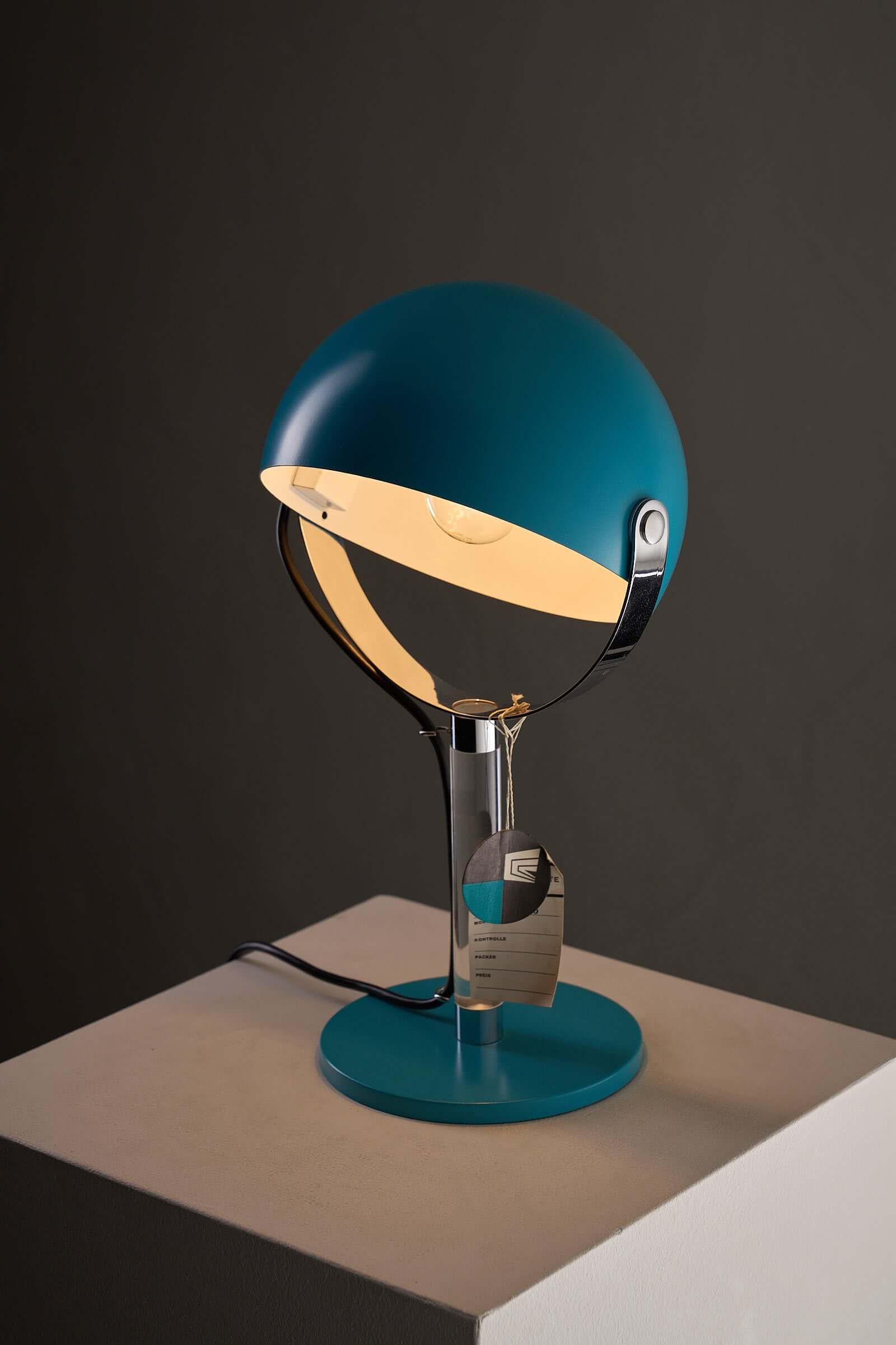 Turquoise Desk Lamp with Acrylic Stem featuring a spherical shade and chrome gimbal arm on a clear acrylic base.
