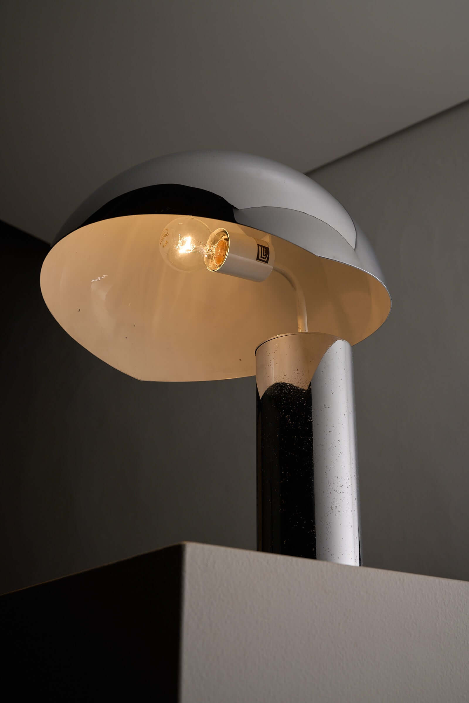 Large Chrome Table Lamp by Cosack shining light with sleek chrome finish and distinctive dome design.