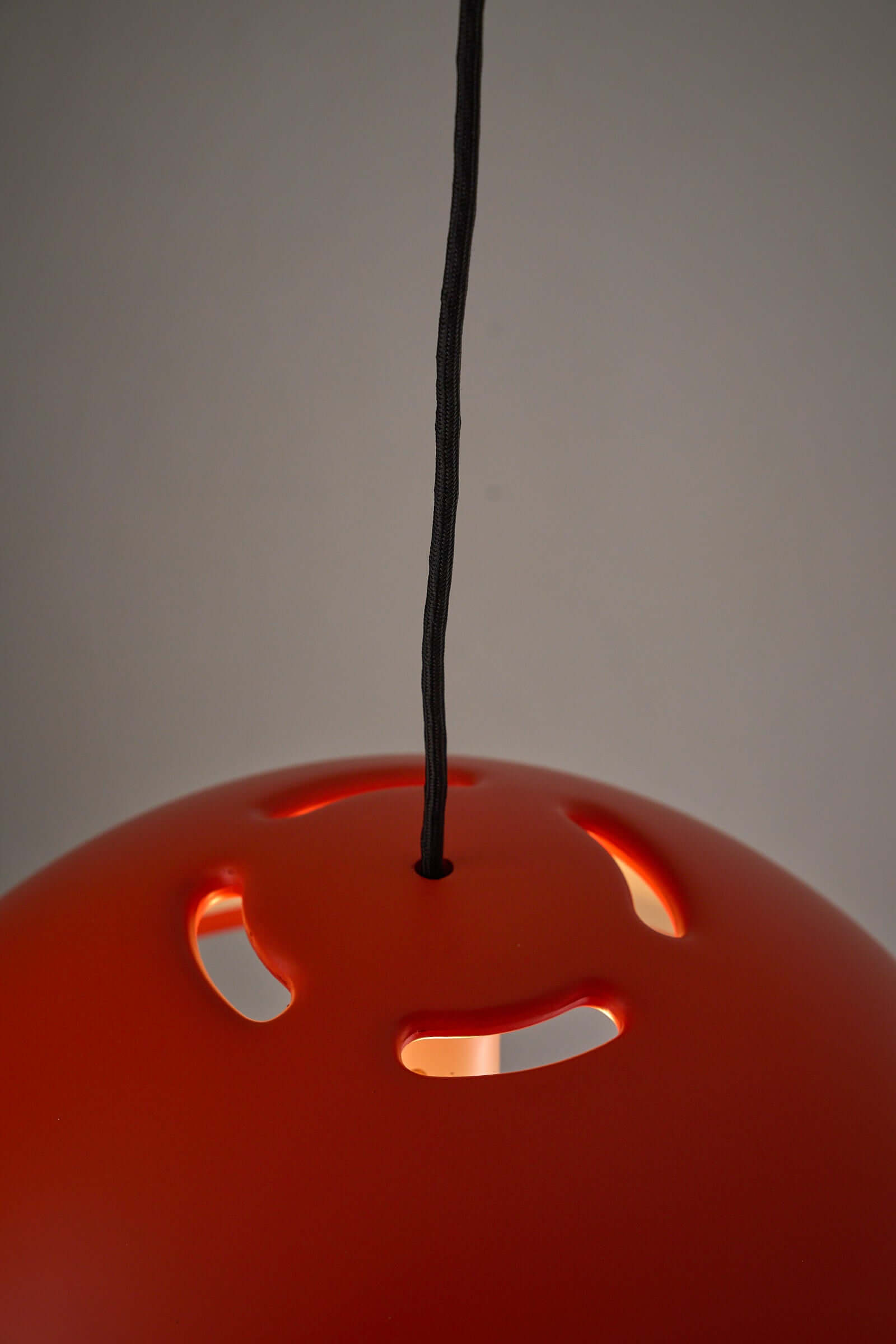 Orange Space Age Data Pendant by Bjarne Bo for Fog & Morup, 1970s with unique air-holes and black cord.