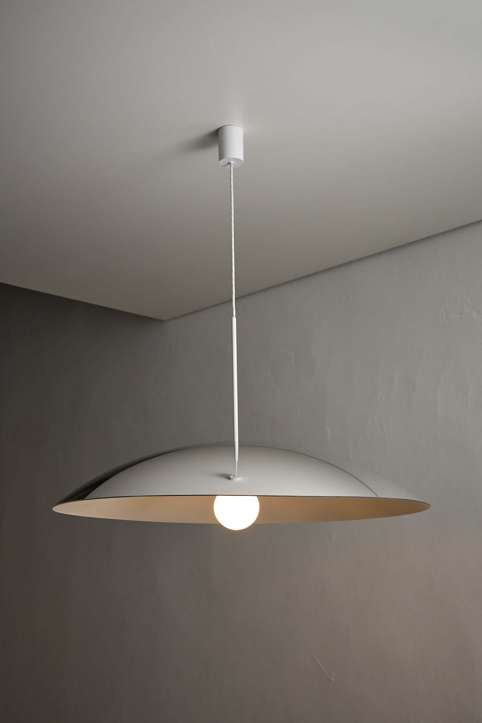 81cm Fog & Mørup Mirrored Ceiling Lamp hanging from the ceiling in a modern interior.