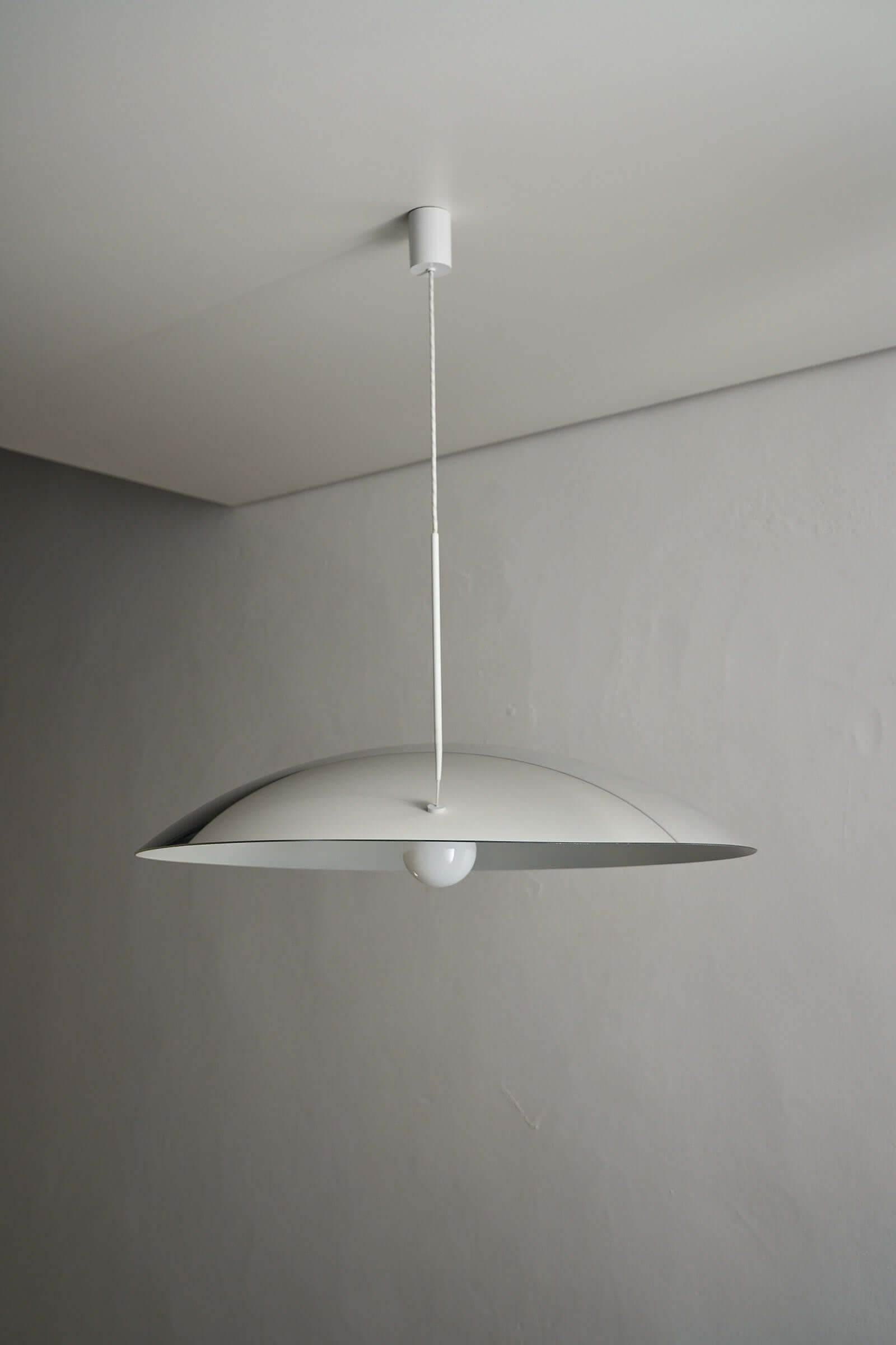 81cm Fog & Mørup Mirrored Ceiling Lamp hanging in a minimalist interior, showcasing its reflective dome design.