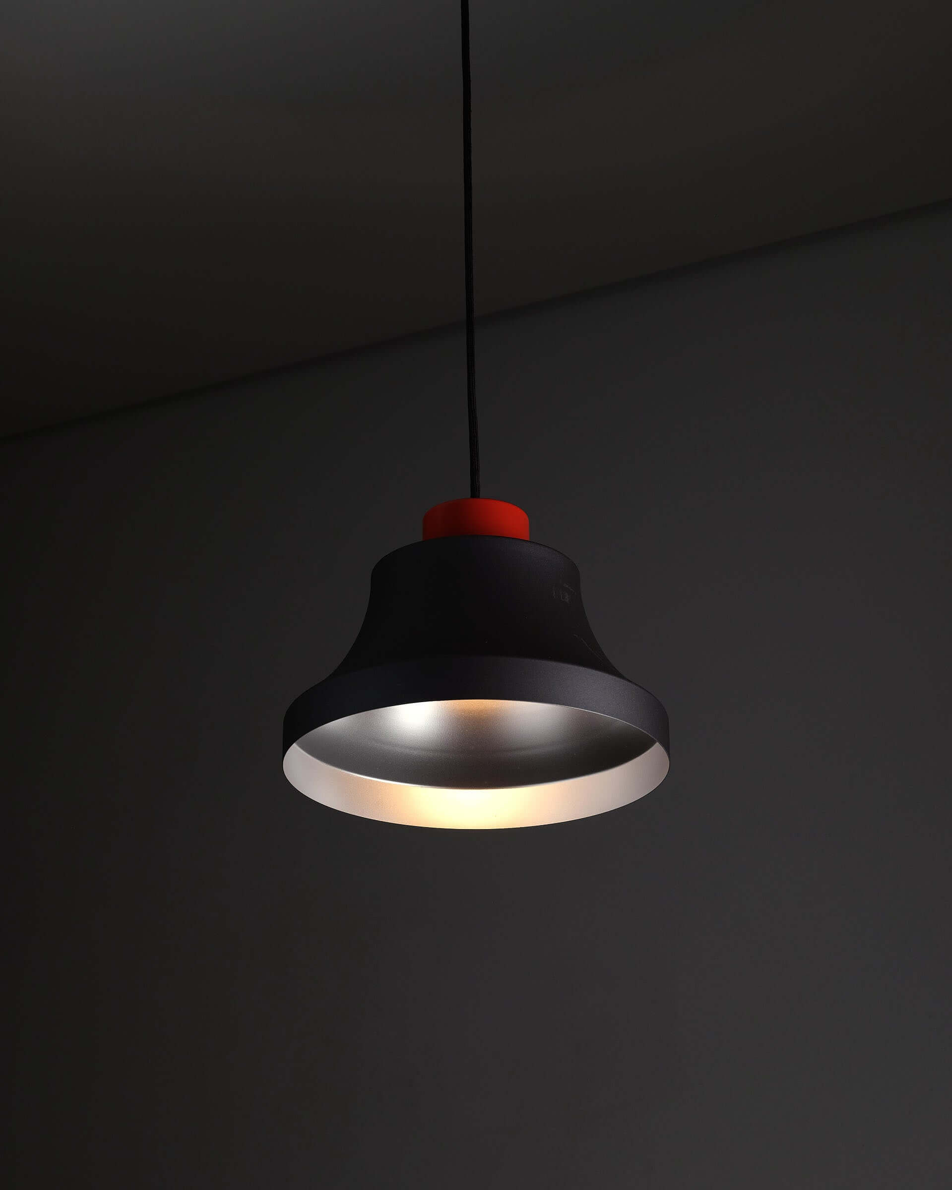 Jo Hammerborg 'Cinderella' Pendant Light in Black and Red (NOS) hanging from the ceiling, showcasing its unique design.