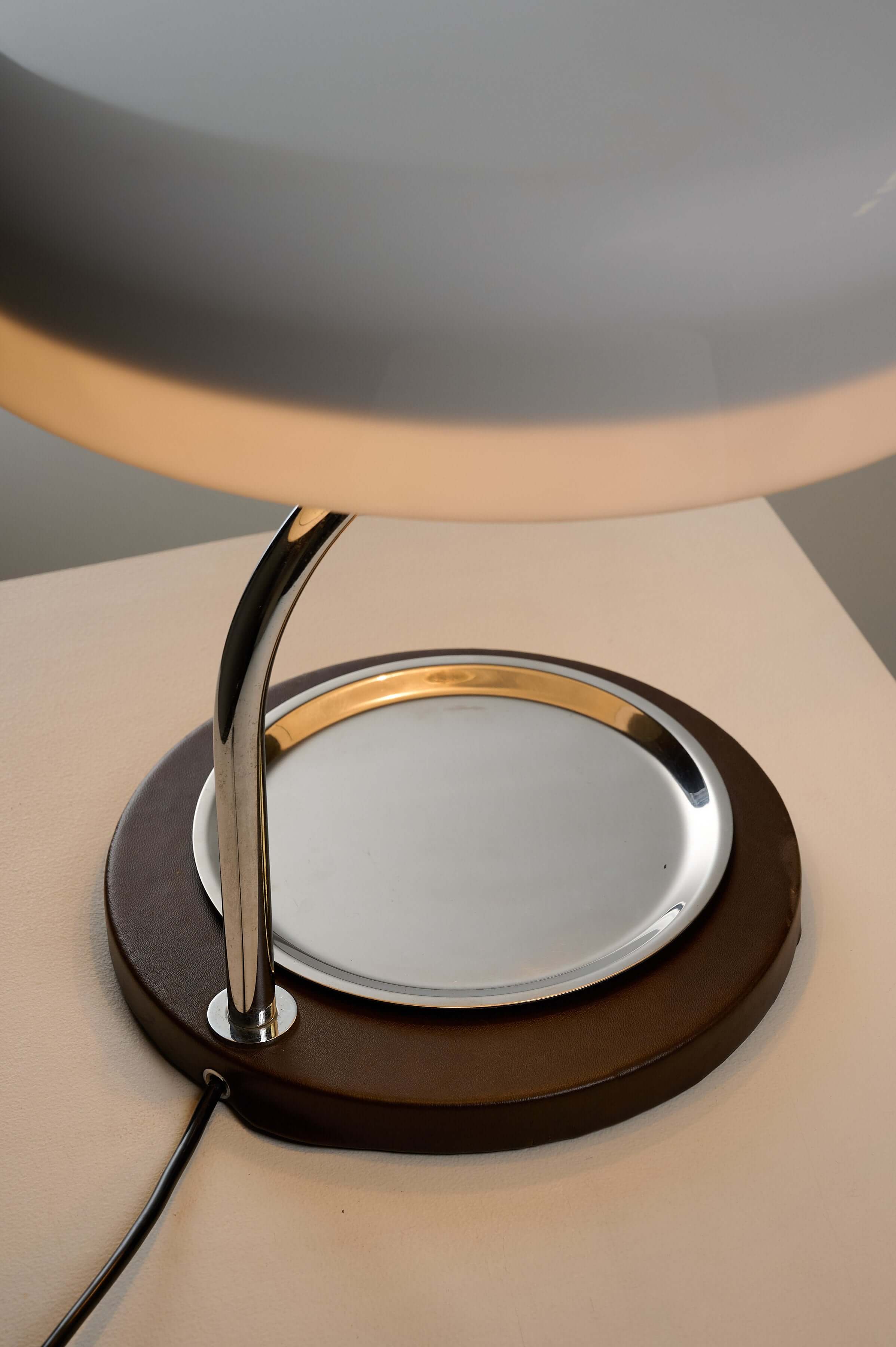 Close-up of the base and chrome arm of the Metalarte Model 4817 Desk Lamp by Gaetano Scolari.