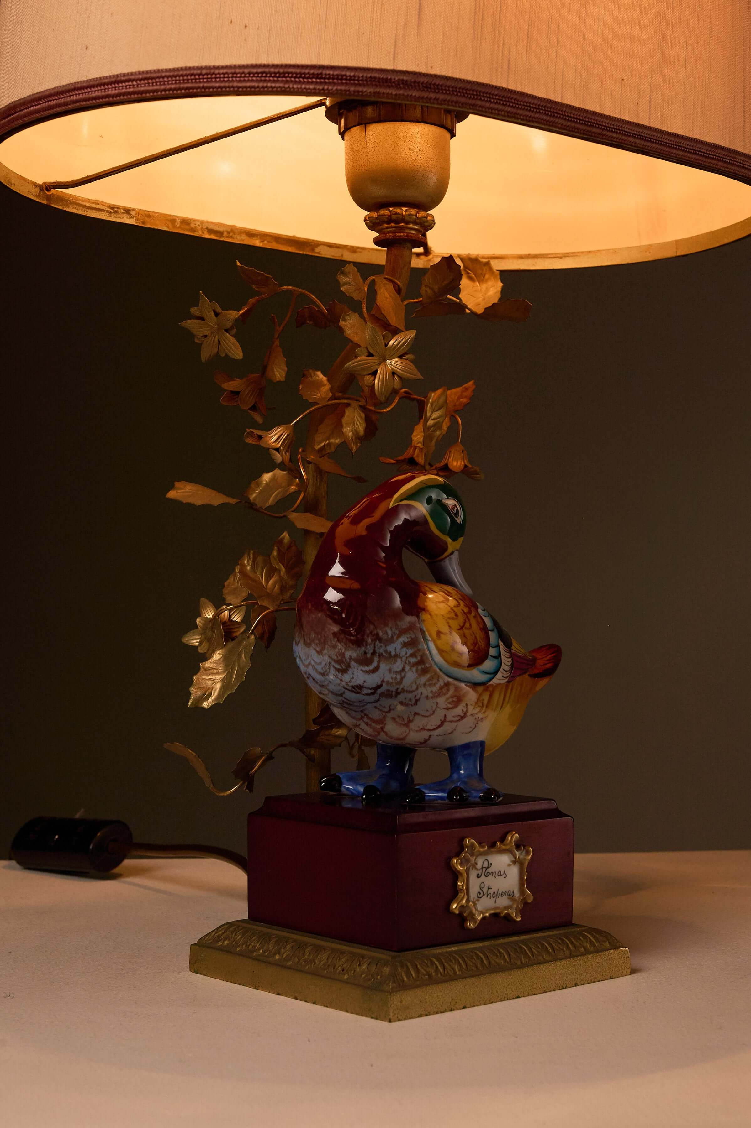 Porcelain 'Anas Strepera' Duck Table Lamp with Brass Foliage featuring vibrant hand-painted duck design.