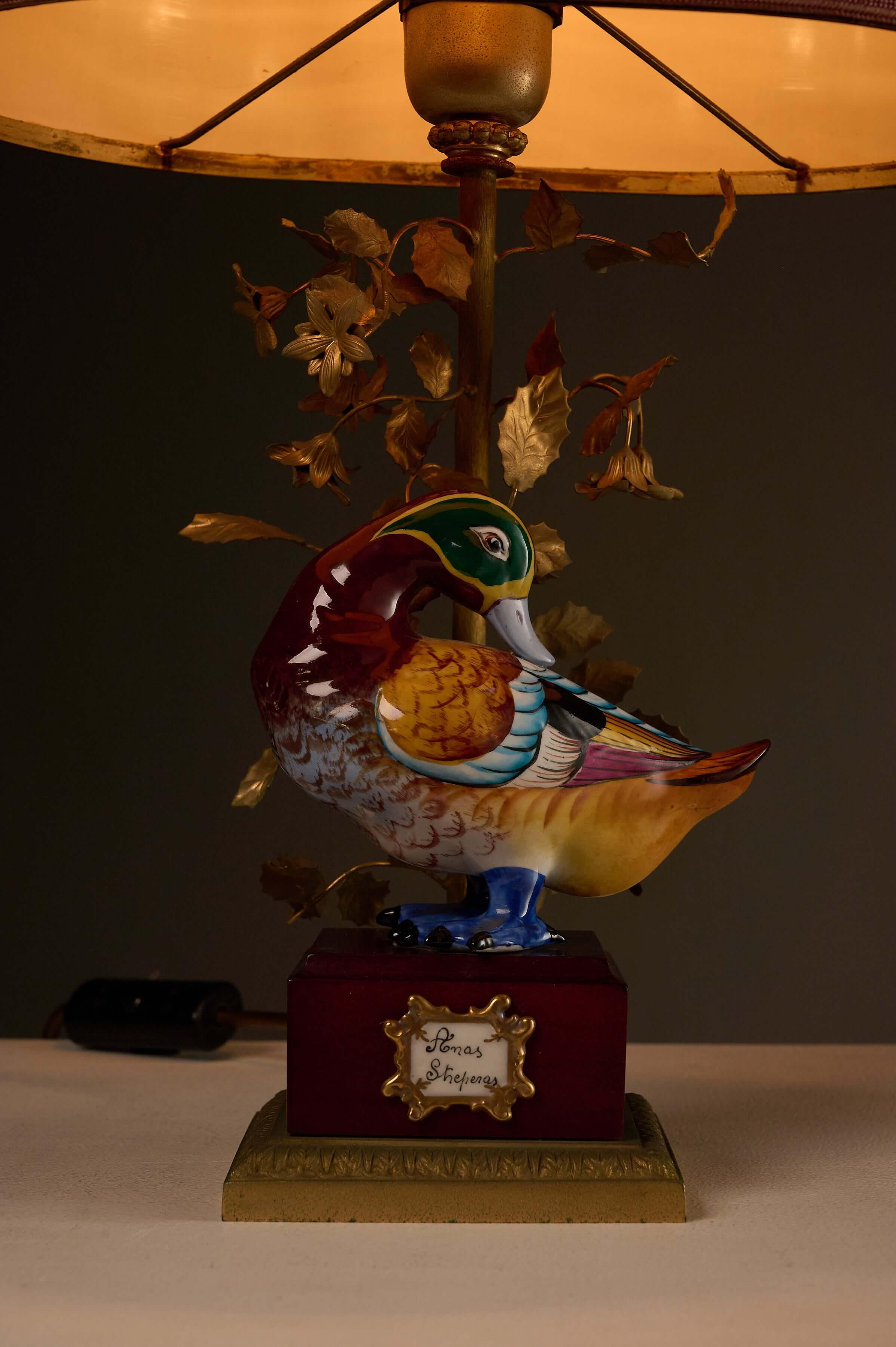 Porcelain 'Anas Strepera' Duck Table Lamp with Brass Foliage featuring a hand-painted duck figure and decorative brass tree.