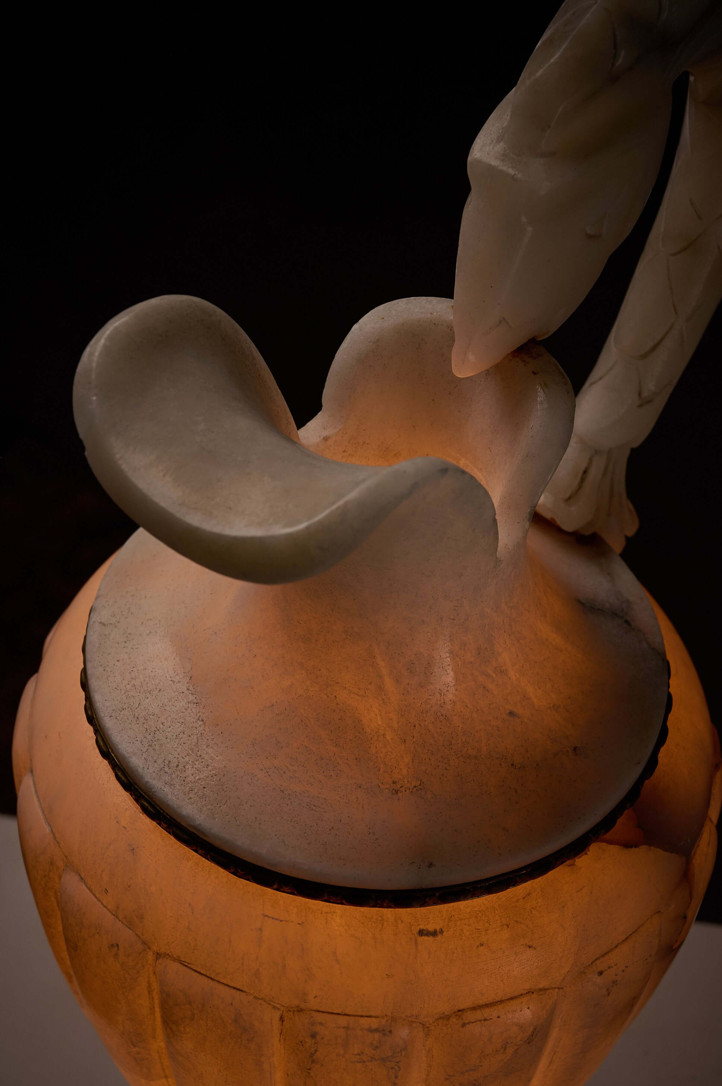 Carved Alabaster Urn Lamp with Stylized Fish Handle, showcasing the intricately carved fish handle and elegant alabaster form.