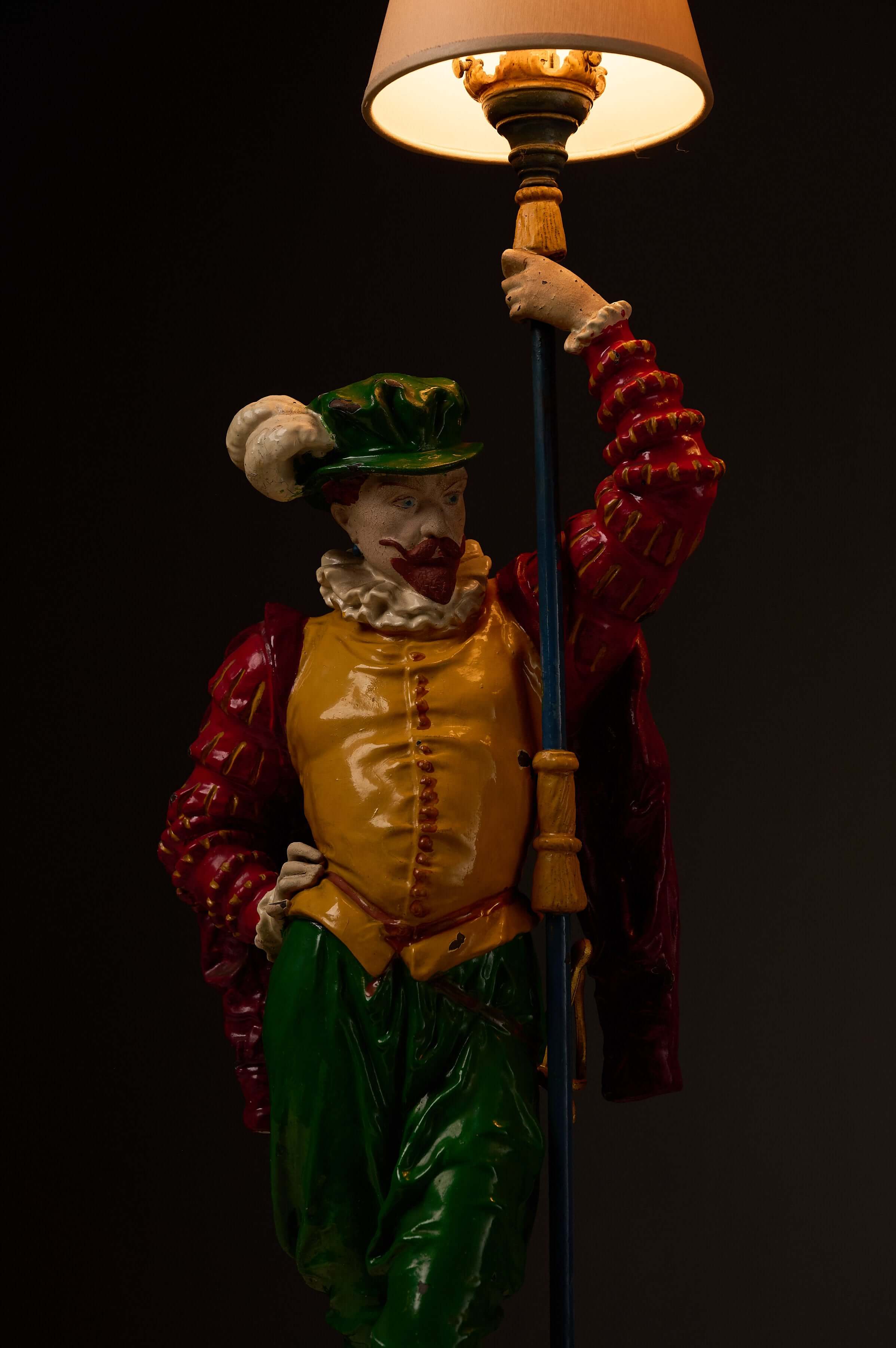 Pair of Painted Cast Iron Guard Figures Table Lamps featuring a colorful musketeer figure holding a lamp.