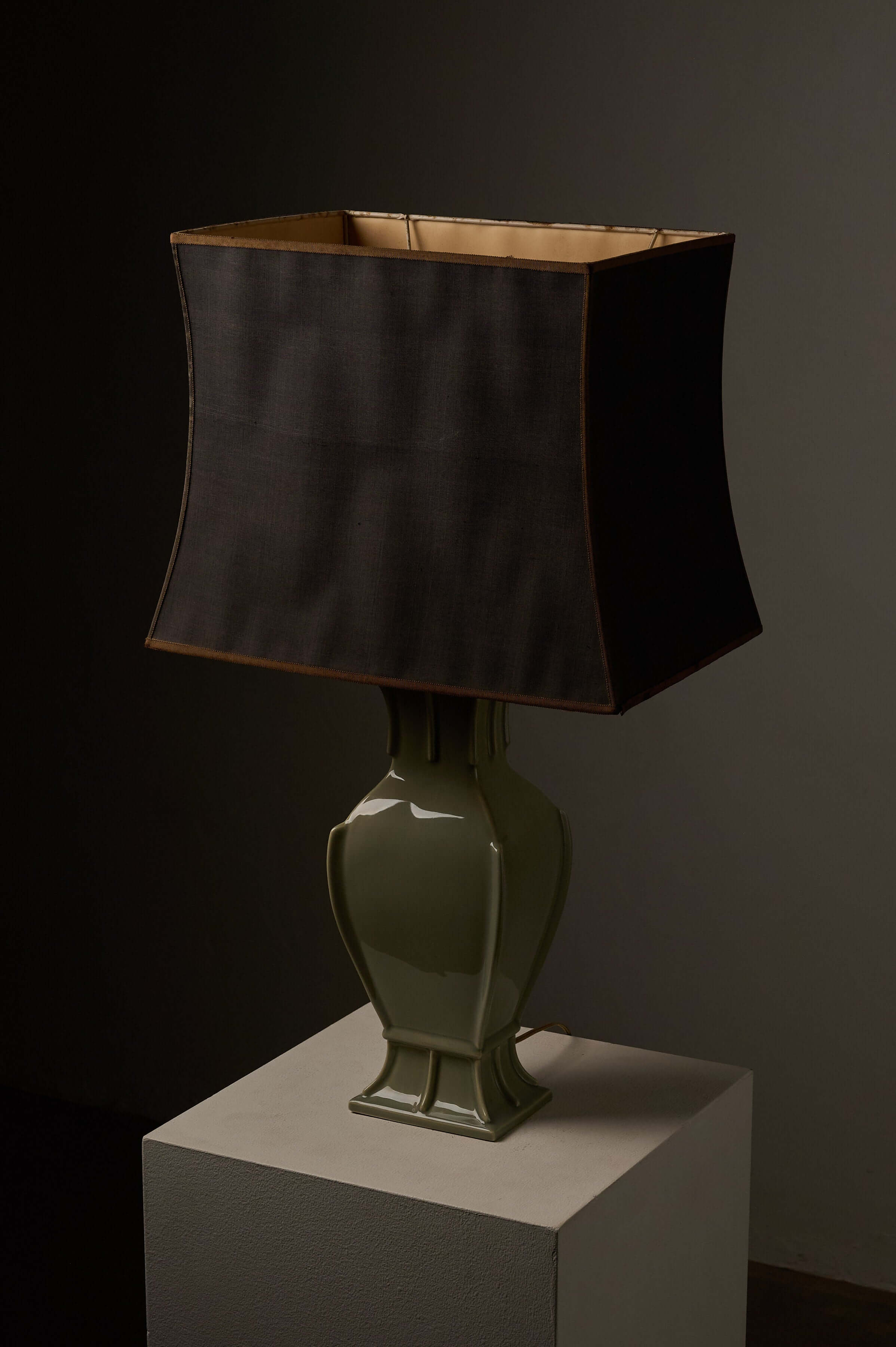 Mid-Century Neoclassical Green Ceramic Table Lamp with olive green baluster base and rectangular black shade.