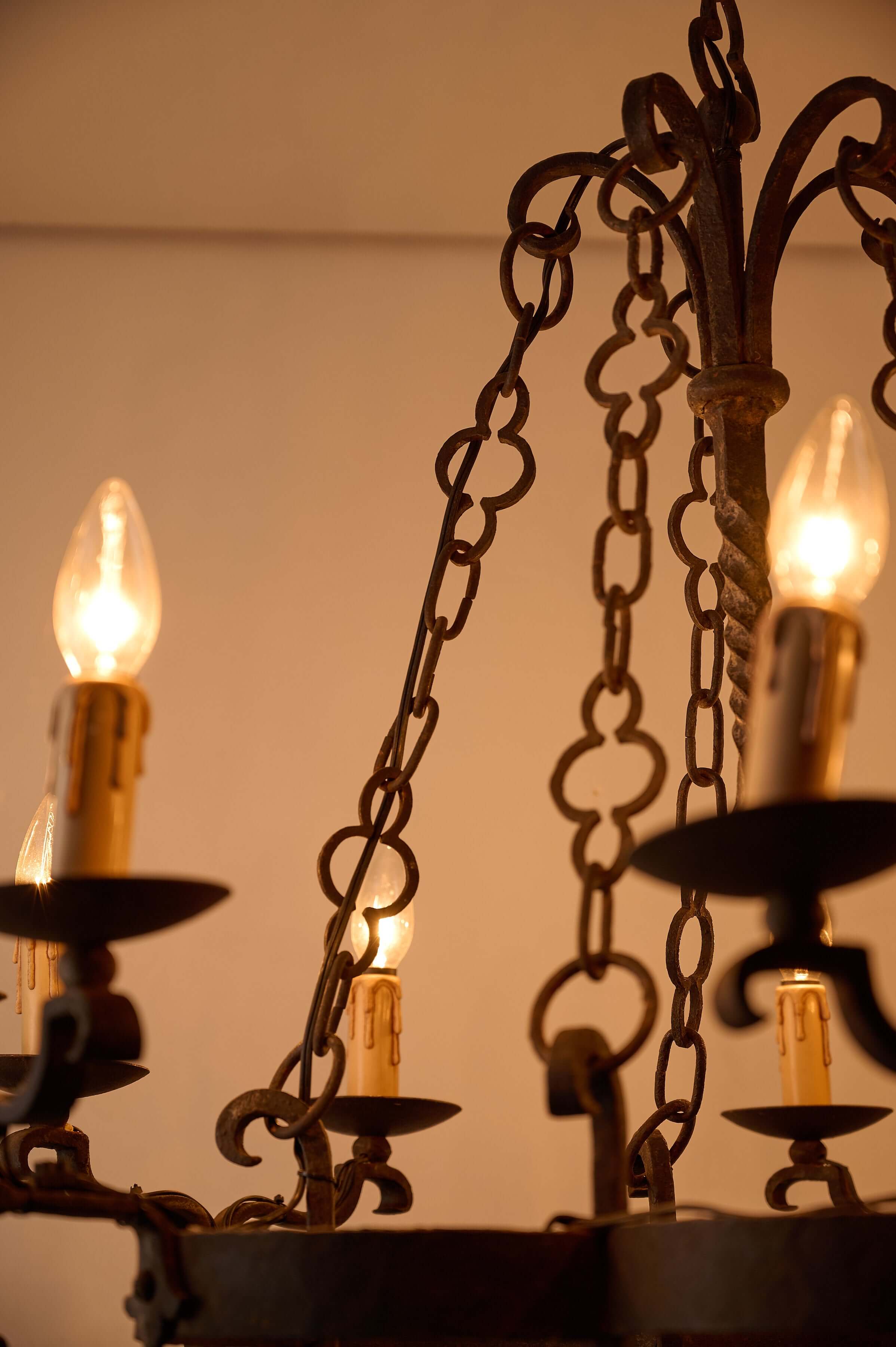 Gothic Style Chandelier with Chain Suspension showcasing candle-style lights and ornate chain design.